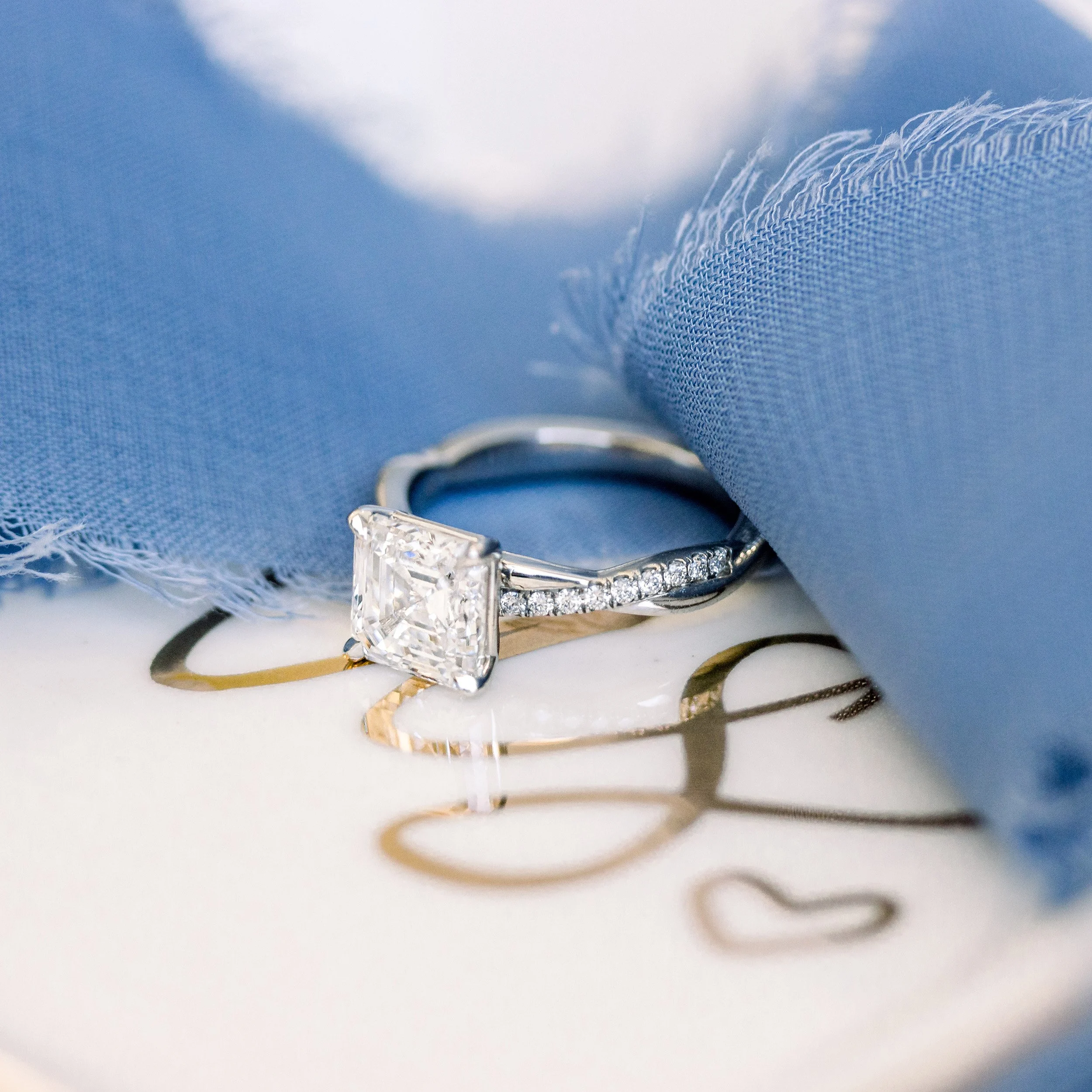 platinum 2 carat asscher cut lab diamond engagement ring with twisting diamond band ada diamonds design ad 154