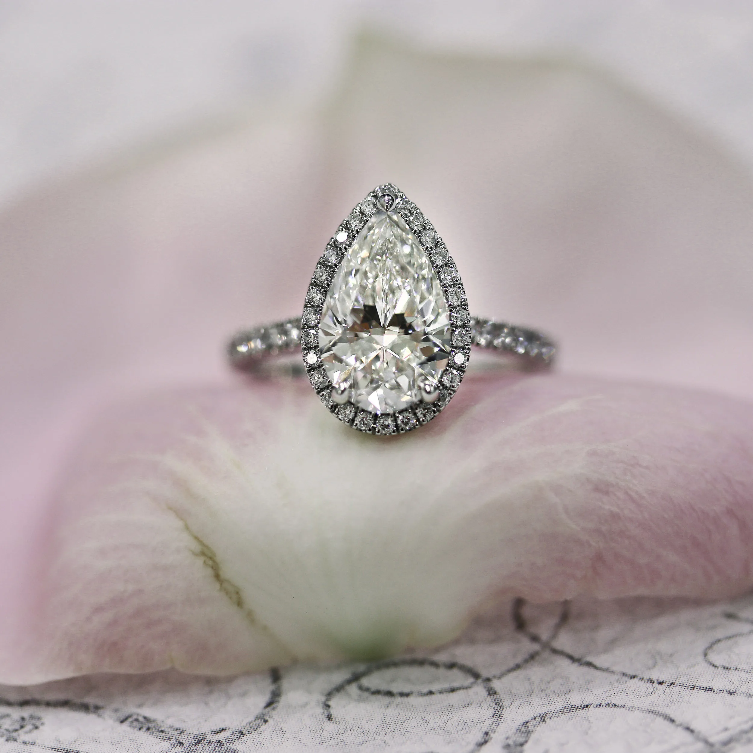 Platinum 2.75 Carat Pear Halo Engagement Ring featuring Man Made Diamonds Ada Diamonds Design Number AD-156 Artistic Shot