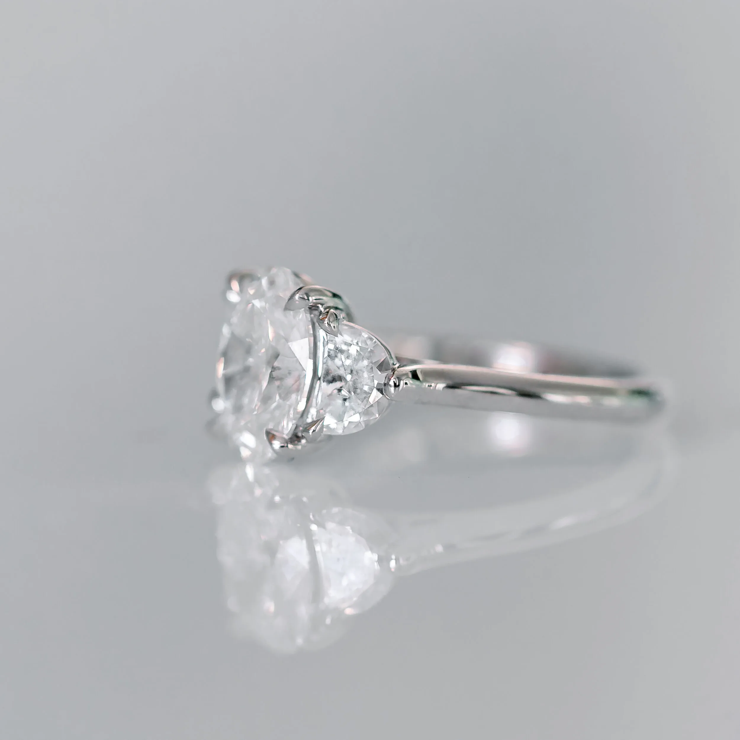 Oval and Half Moon Diamond Engagement Ring