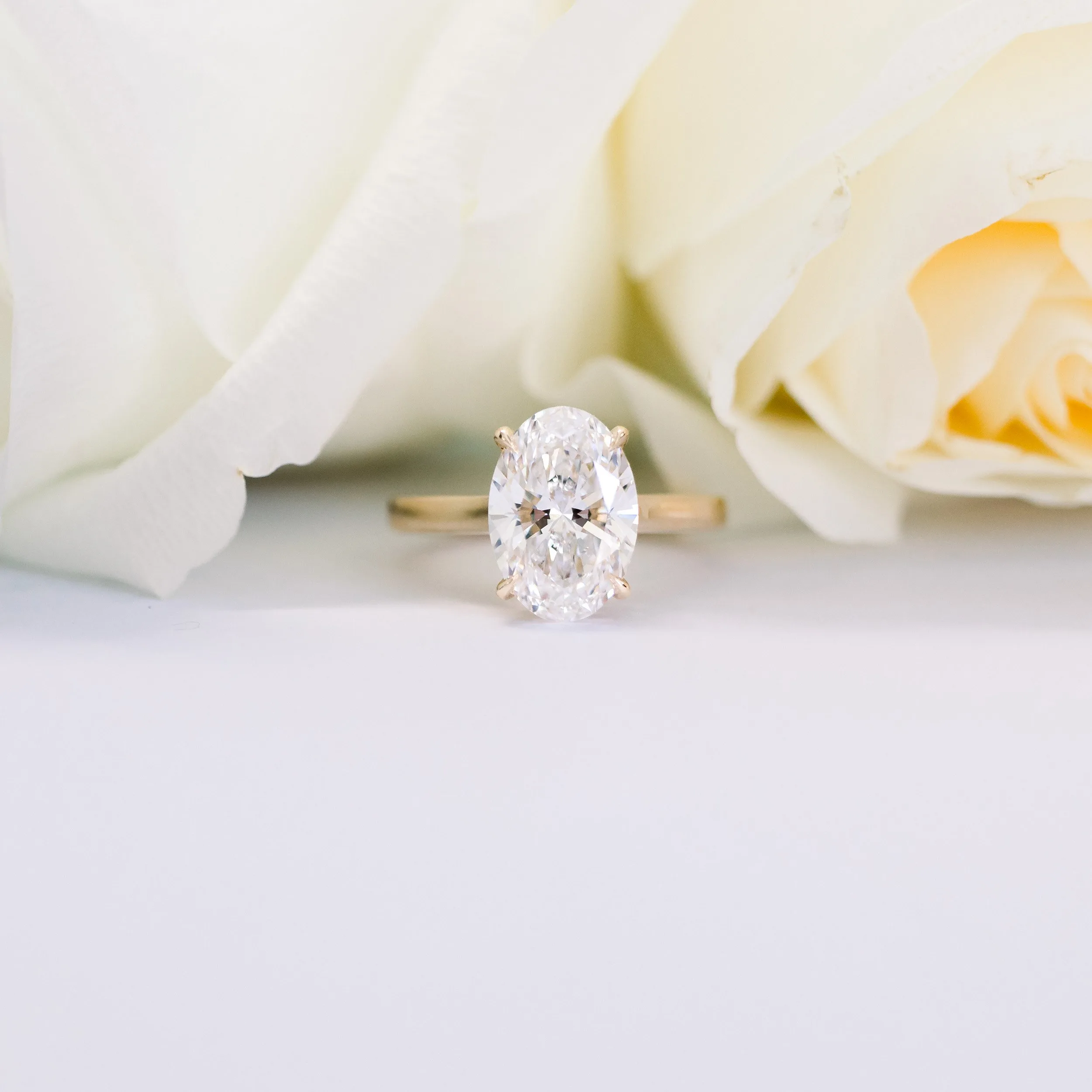 Oval Cathedral Solitaire Diamond Engagement Ring