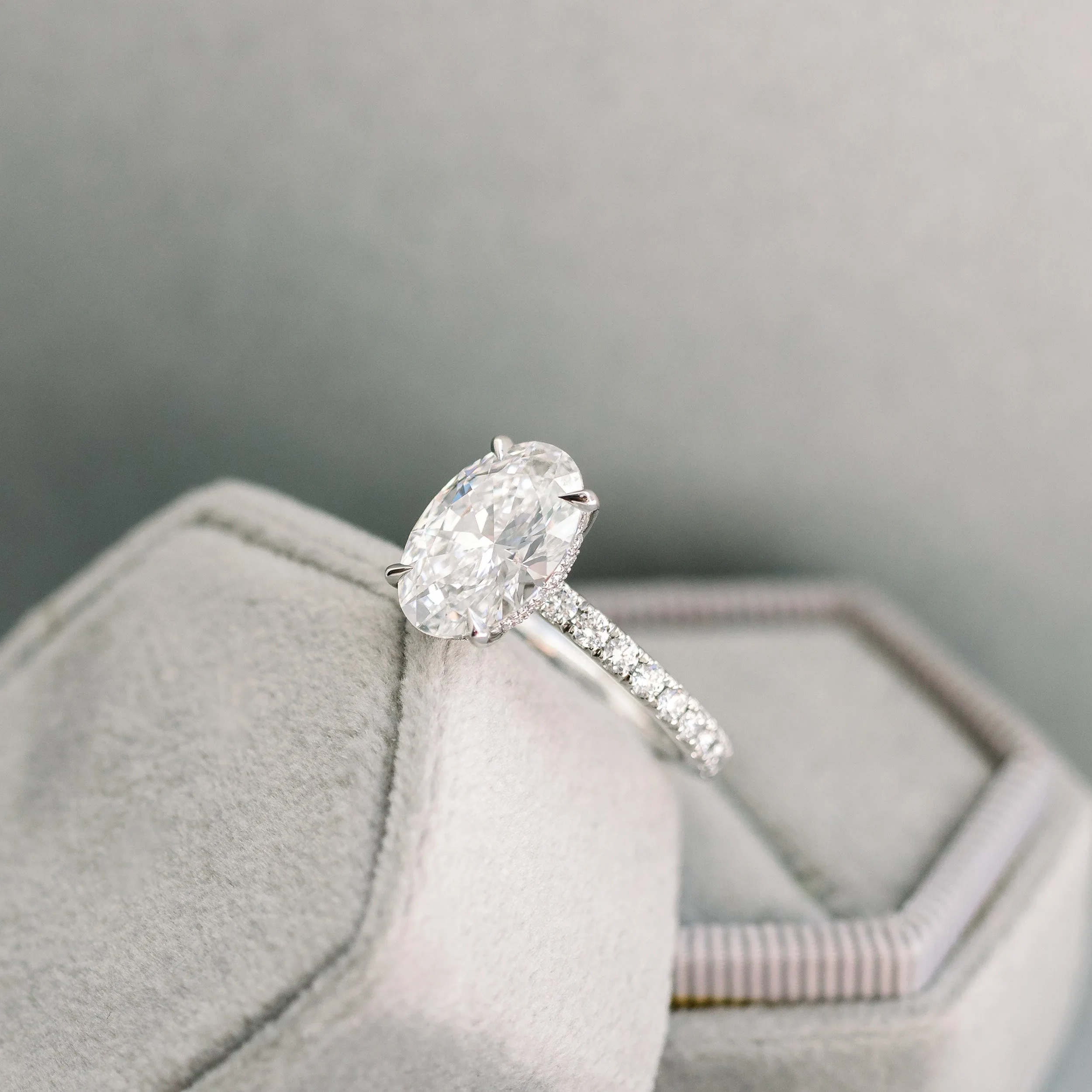 platinum 3ct oval petite four prong pavé engagement ring with hidden halo ada diamonds design 230 side view