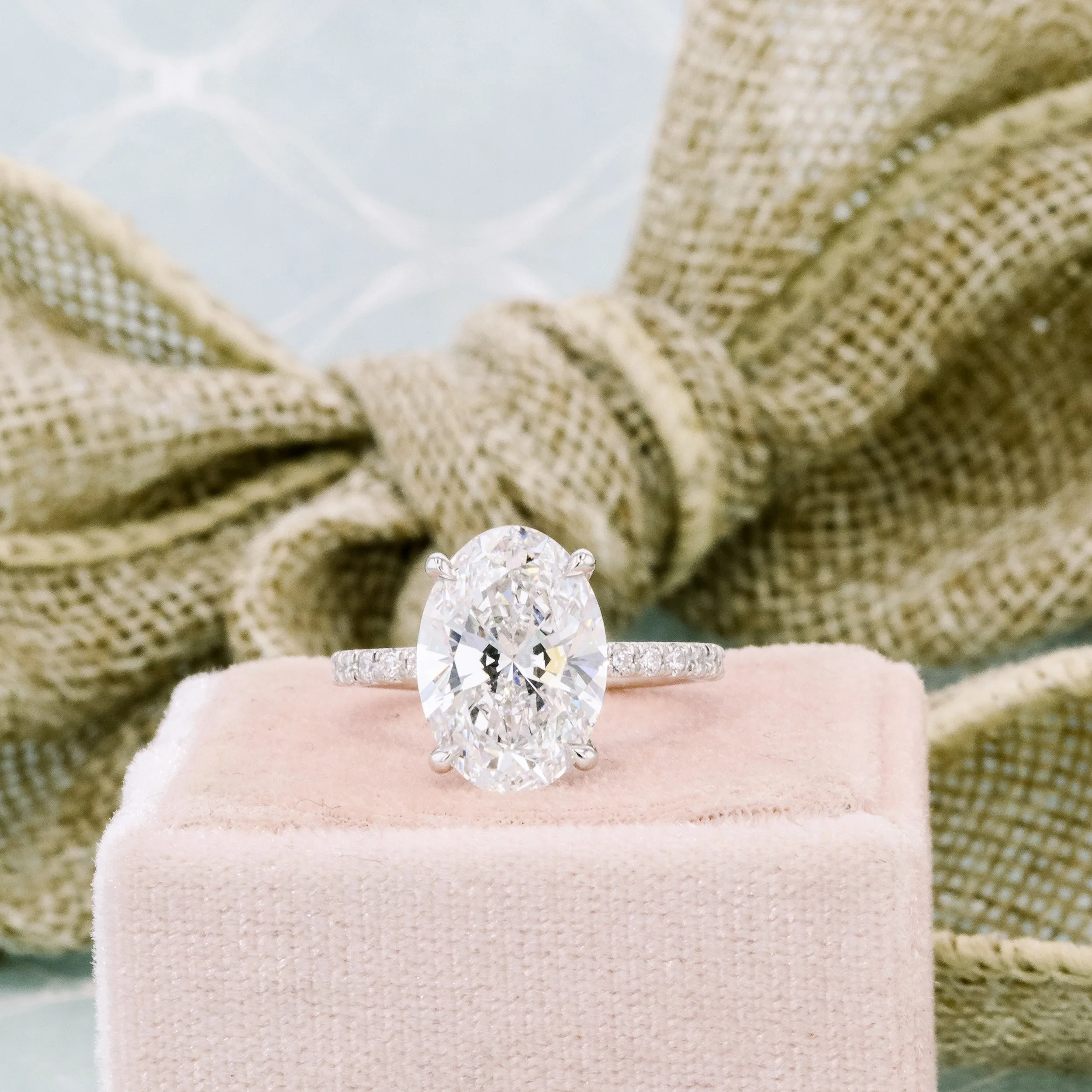 platinum 4 carat oval cut man made diamond pavé engagement ring ada diamonds design ad 230 macro