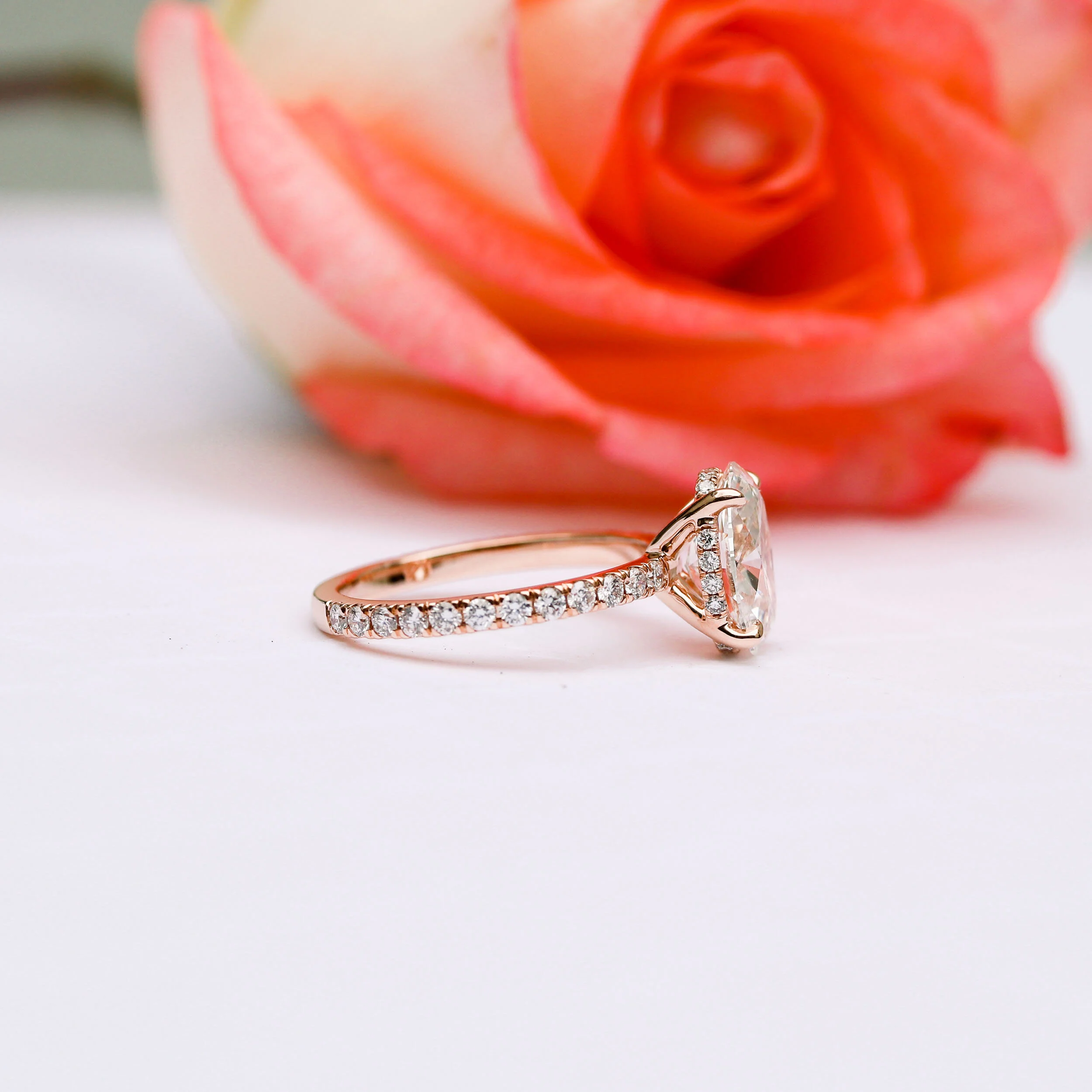 2.5 Carat Oval Lab Diamond Pavé Engagement Ring in Rose Gold Side View Ada Diamonds AD-230