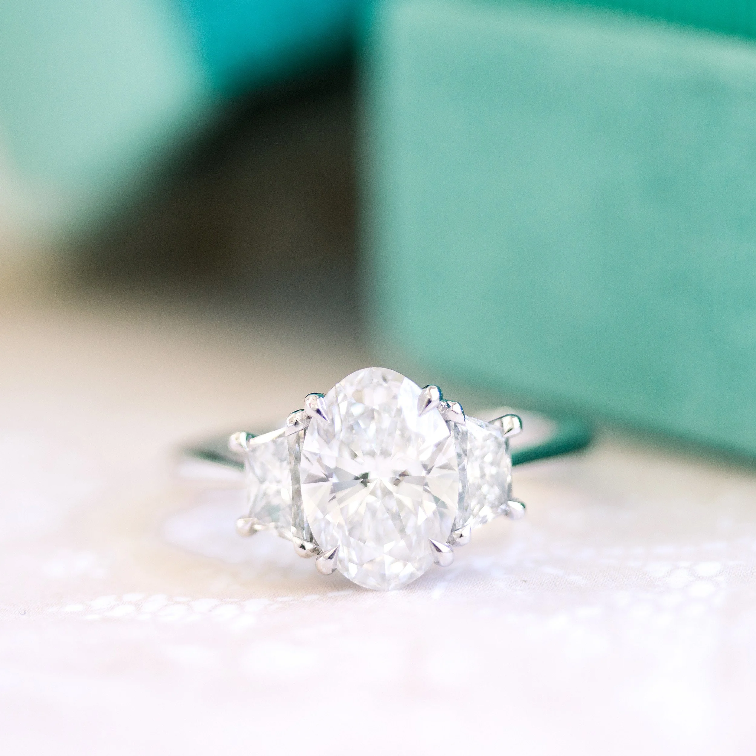 platinum 2.5 ct oval lab diamond ring with trapezoid side stones ada diamonds design ad 462 macro