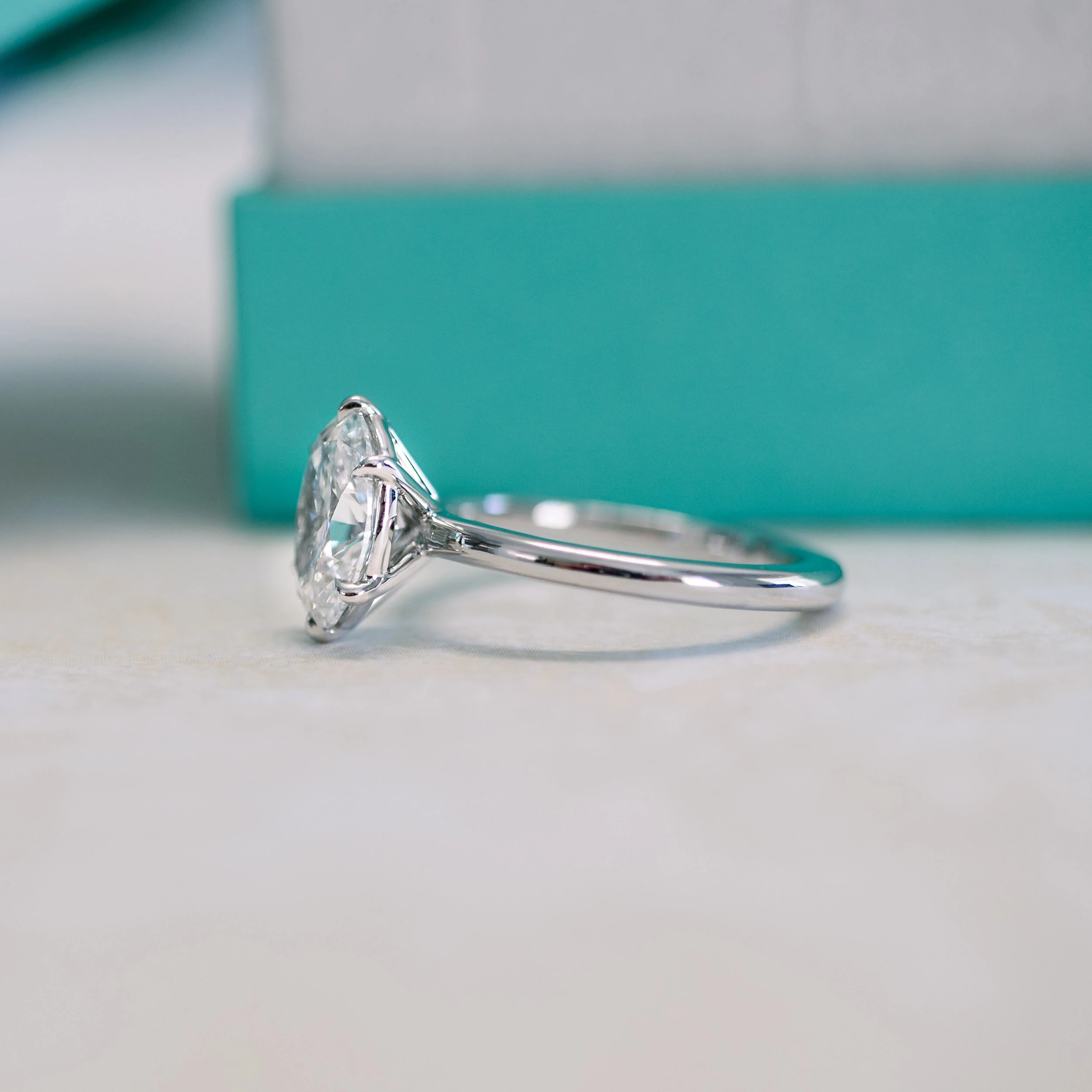 lab created oval solitaire in platinum