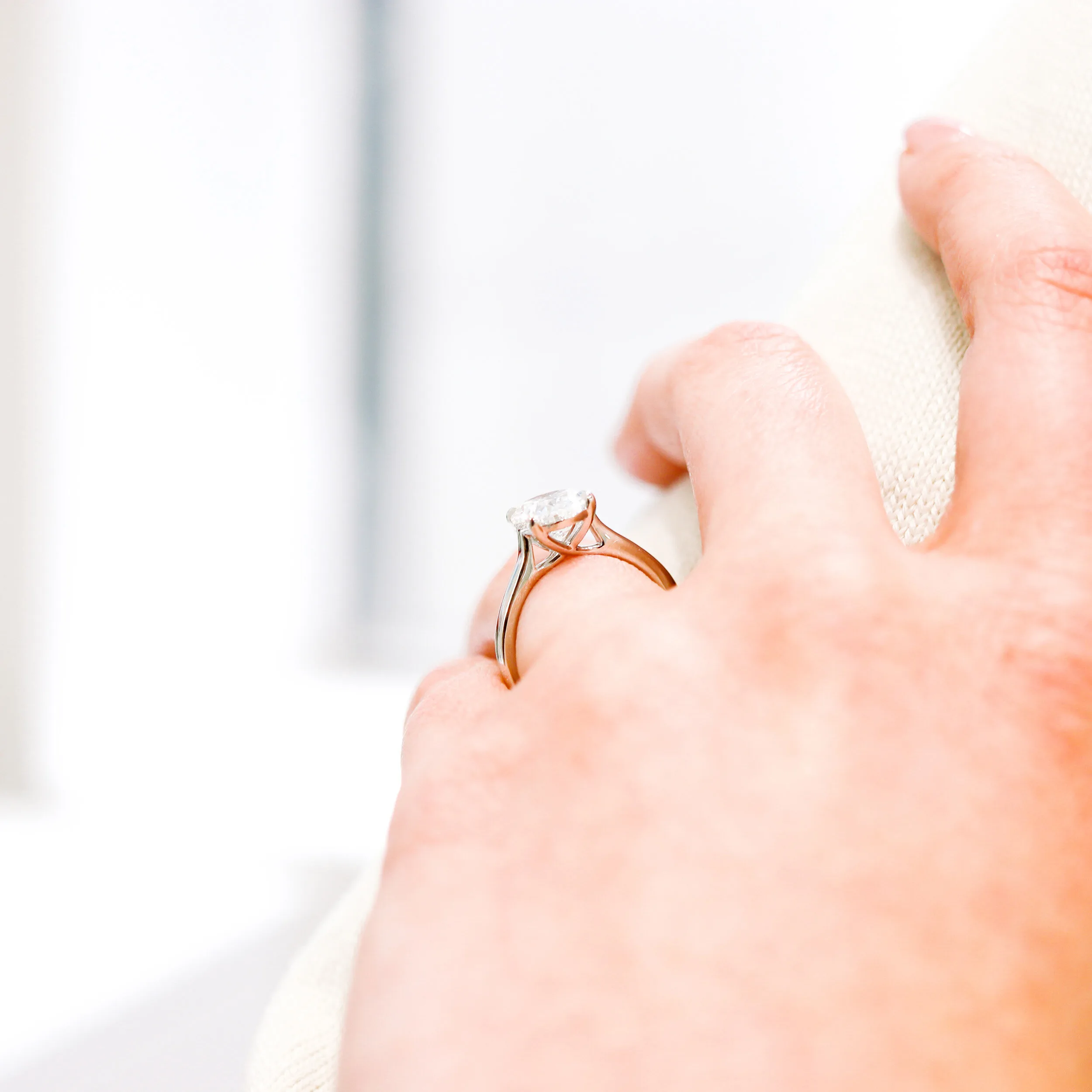 18k White Gold 2.5 carat Oval Lab Diamond Trellis Solitaire Engagement Ring Ada Diamonds Design AD-328 Profile on Hand