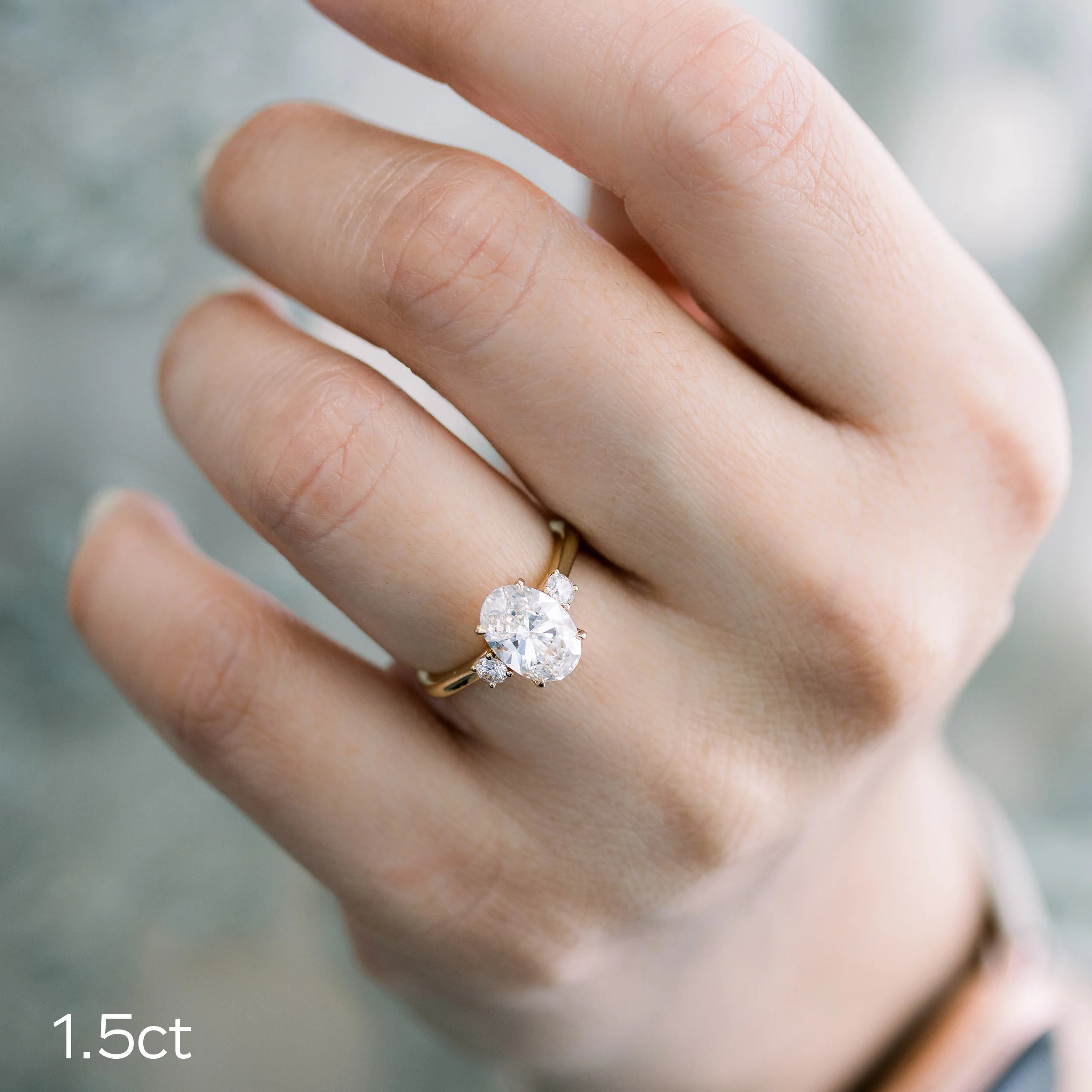 lab diamond three stone engagement ring round and oval