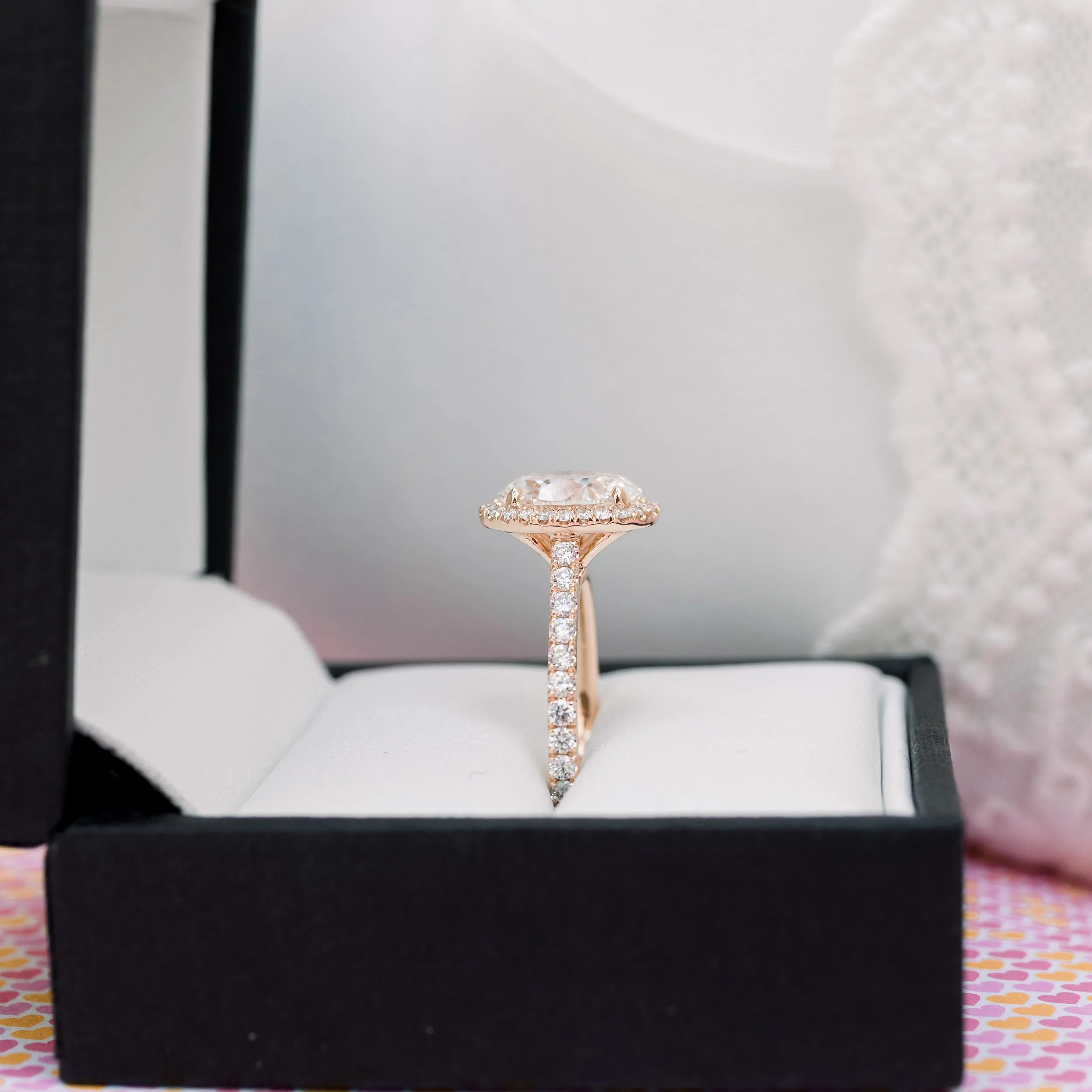 14k rose gold oval lab grown diamond 1.75 carat halo engagement ring with diamond band ada diamonds design ad 303