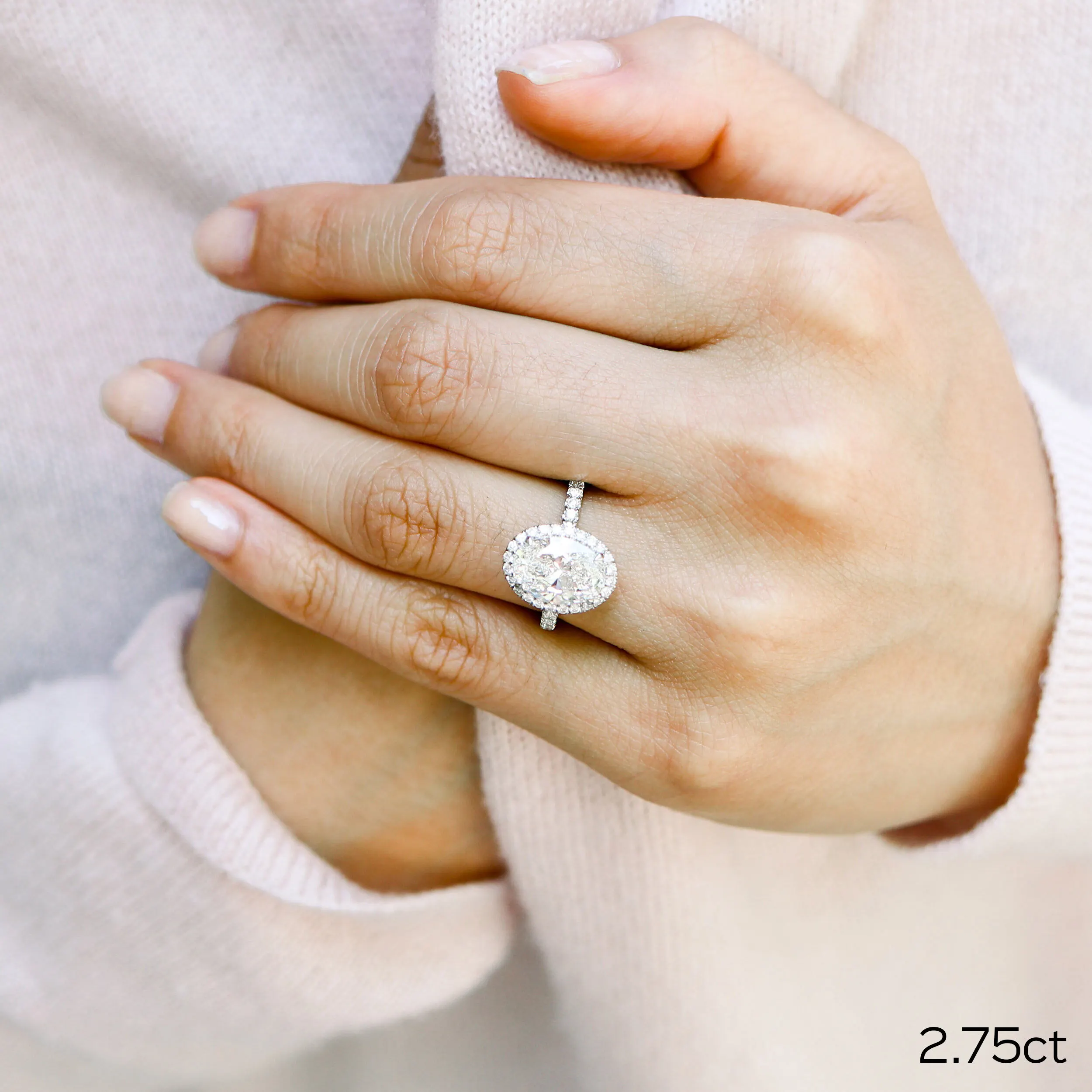 Platinum 3 Carat Oval Cut Lab Diamond Halo Ring with Diamond Band Ada Diamonds Design AD-303 on Model