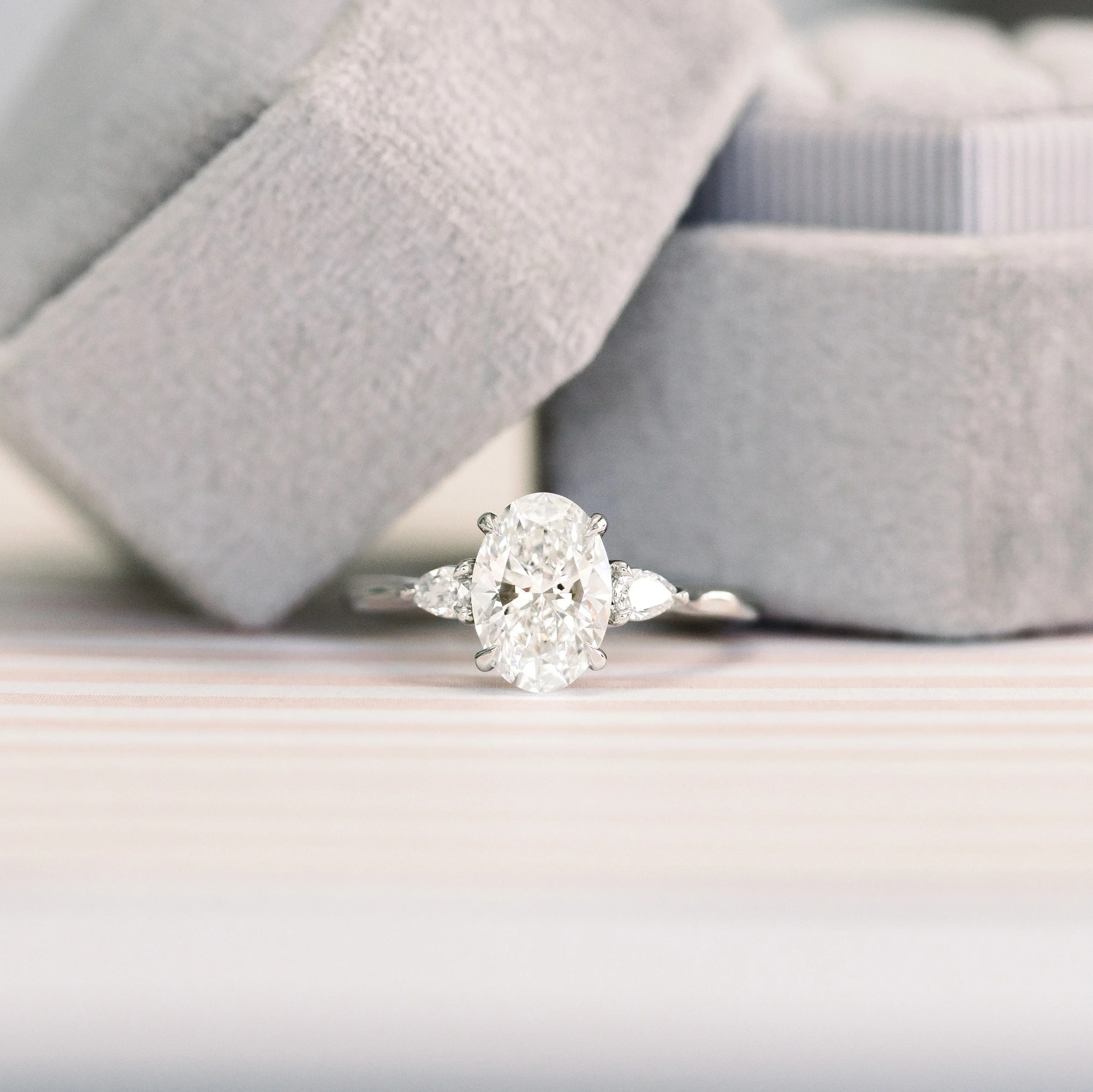 platinum 2 carat oval and pear three stone lab diamond engagement ring ada diamonds design ad 460