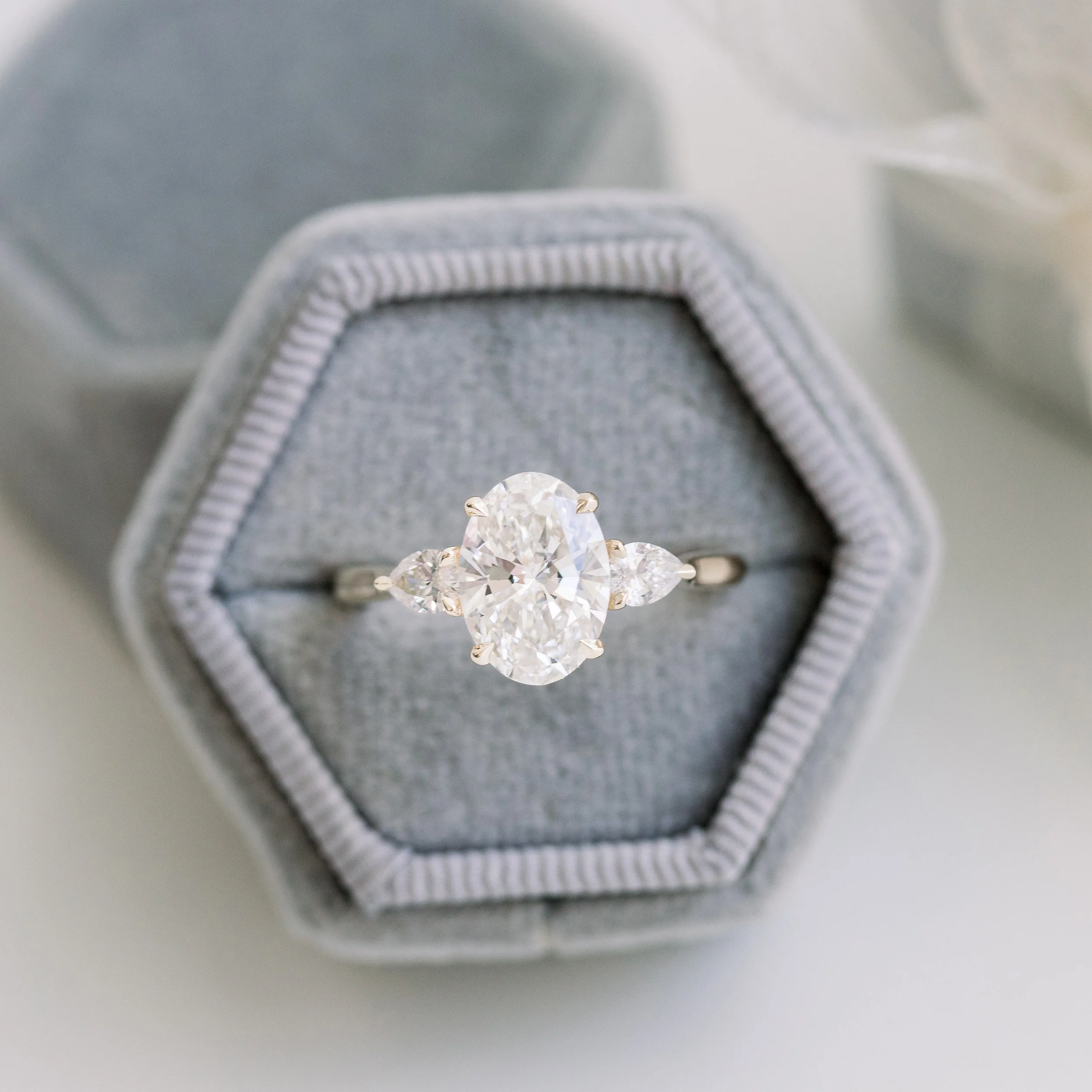 Oval and Pear Diamond Engagement Ring