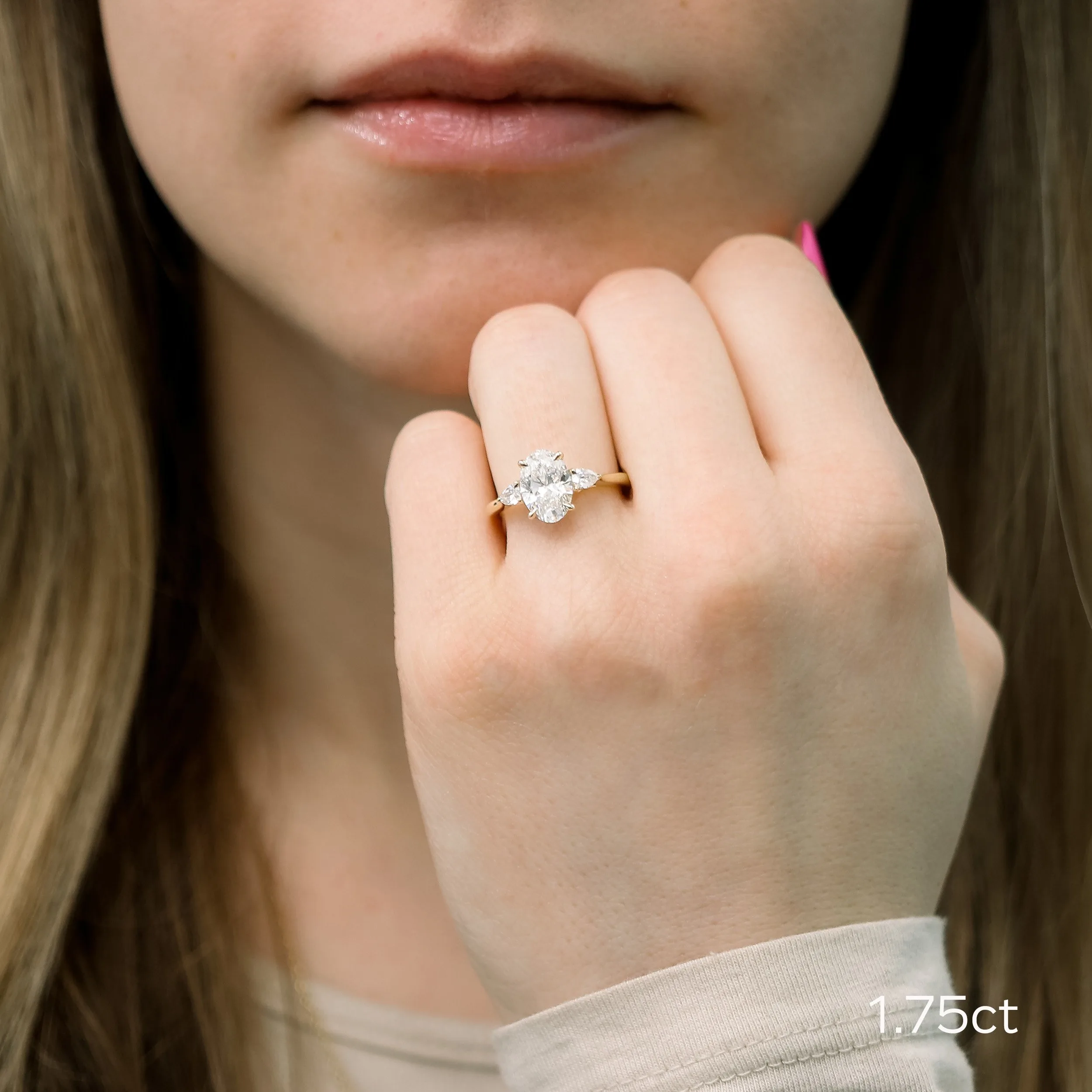 yellow gold 1.75 carat oval lab diamond three stone ring with pear side stones ada diamonds design ad 460 on model