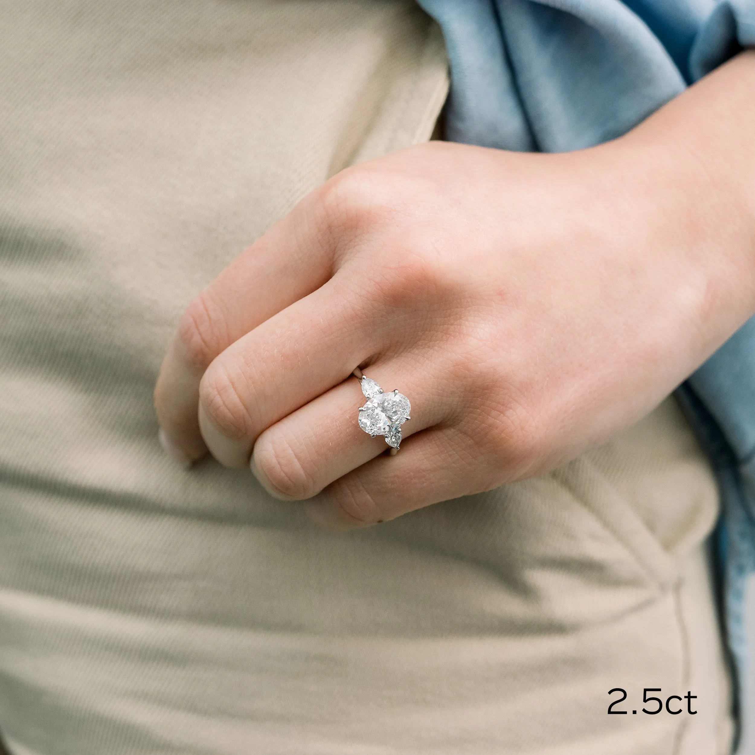 platinum 2.5ct oval and pear lab diamond three stone engagement ring ada diamonds design ad 460 on model