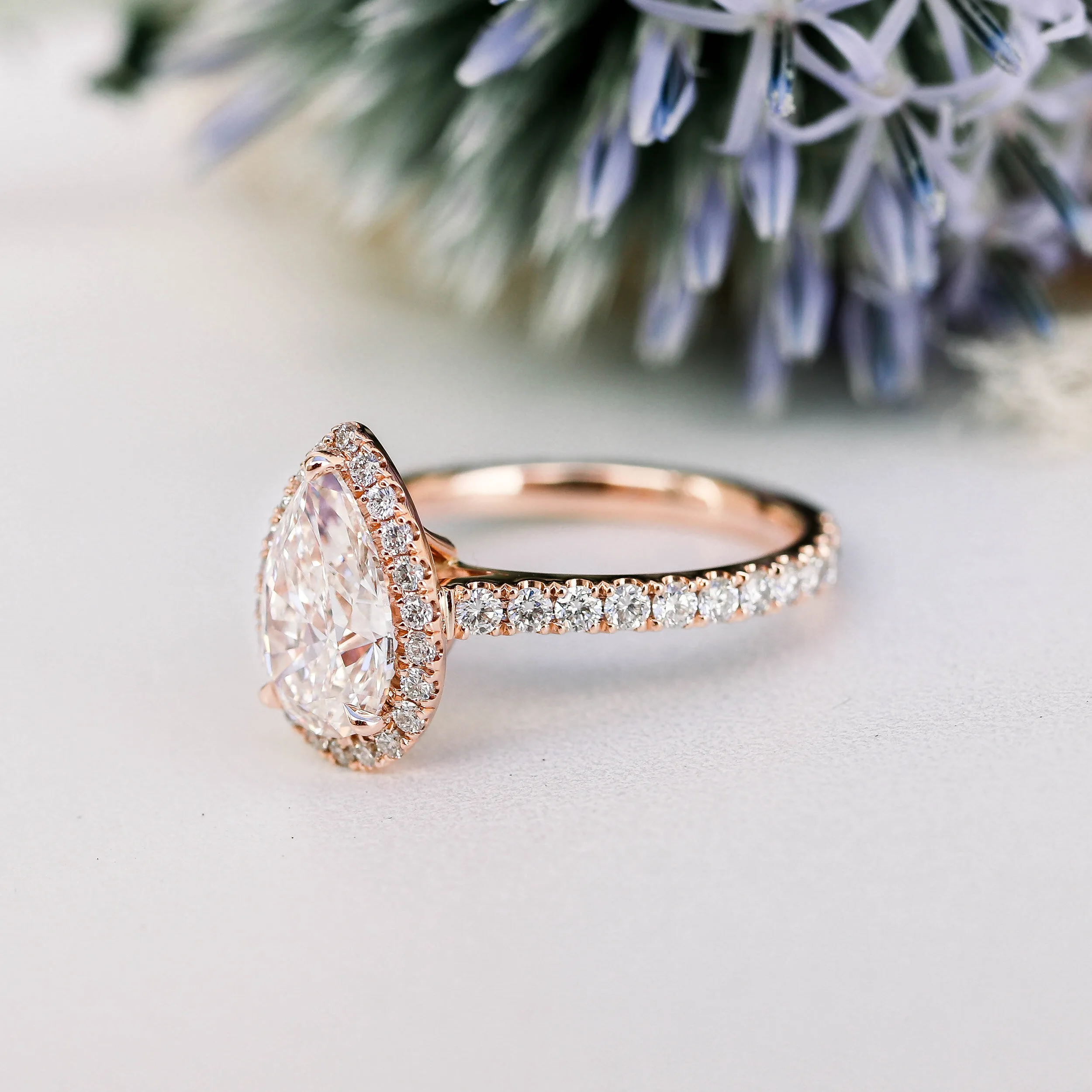 18k Rose Gold 2 Carat Pear Halo Engagement Ring with Diamonds Around the Band made with lab grown diamonds Ada Diamonds Design AD-304