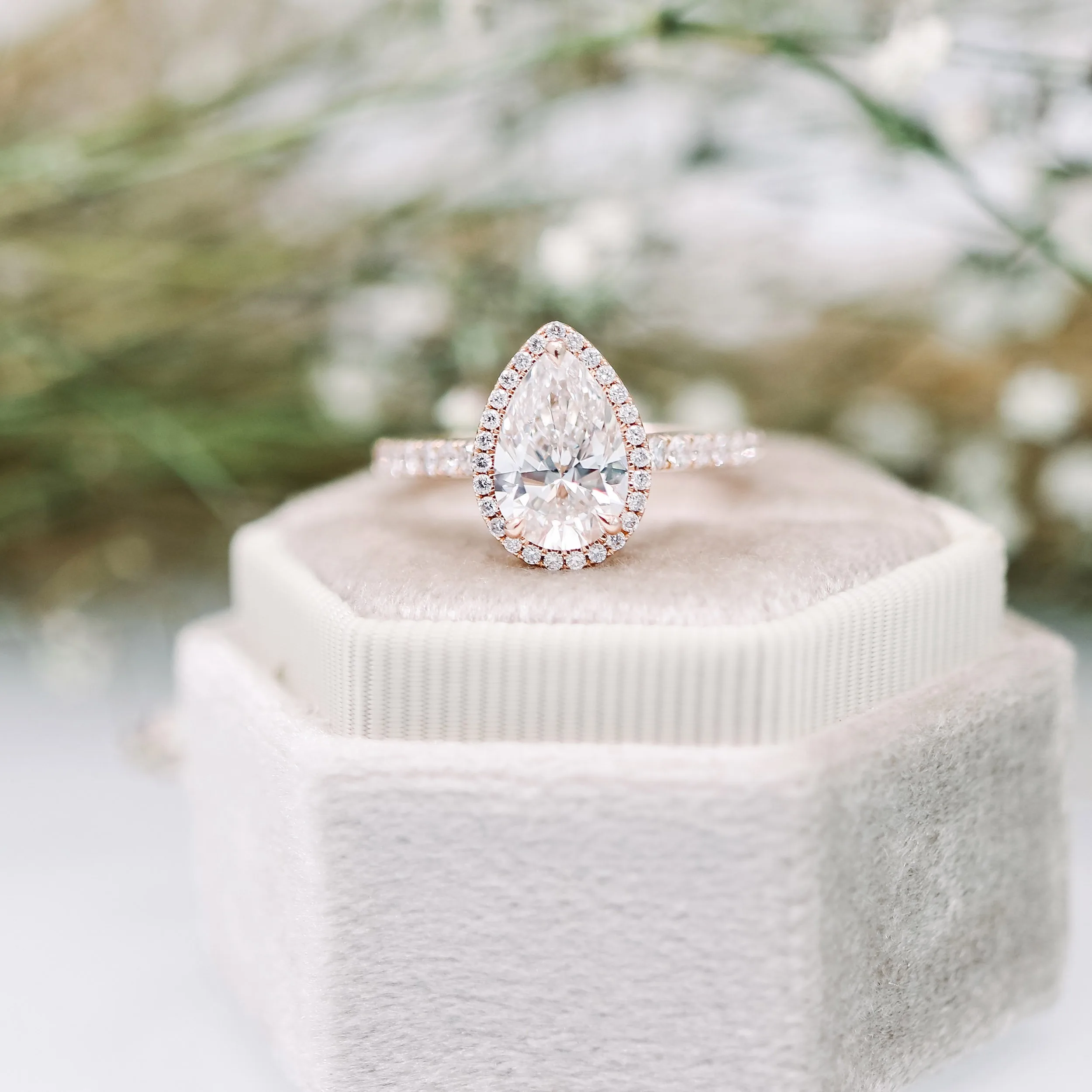 pear lab diamond in rose gold halo setting