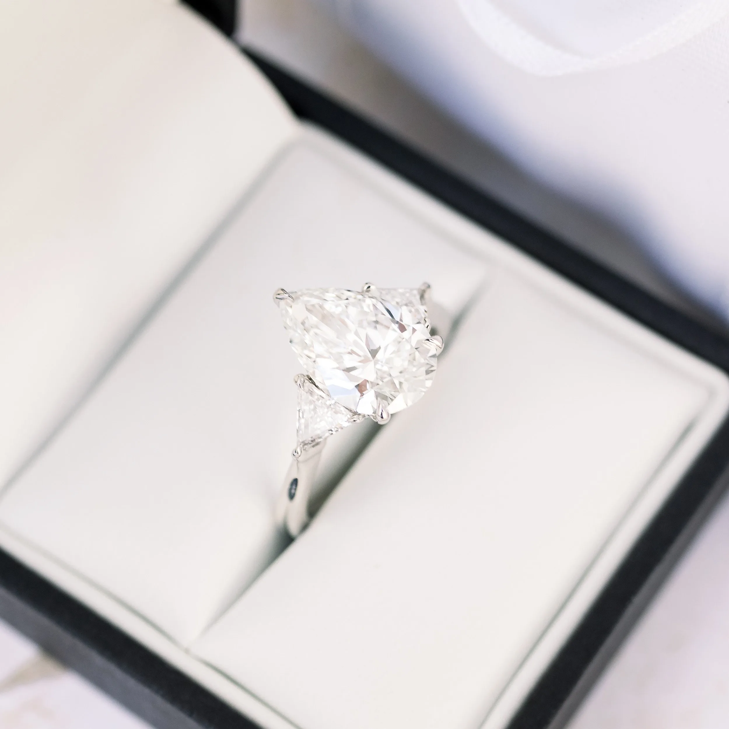 platinum 3.5 carat pear and trillion three stone lab created diamond engagement ring ada diamonds design ad 496 in box