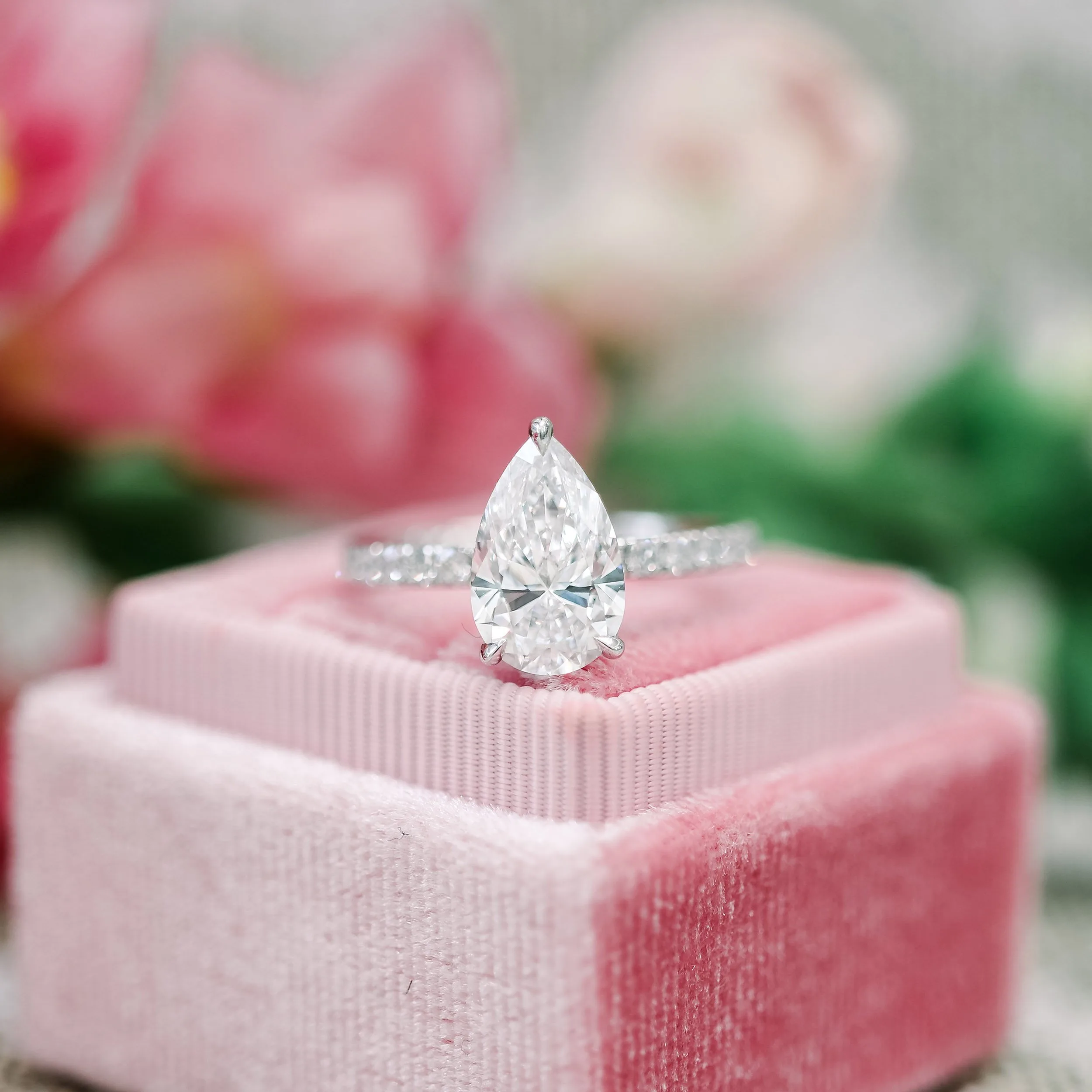 platinum pear pave engagement ring