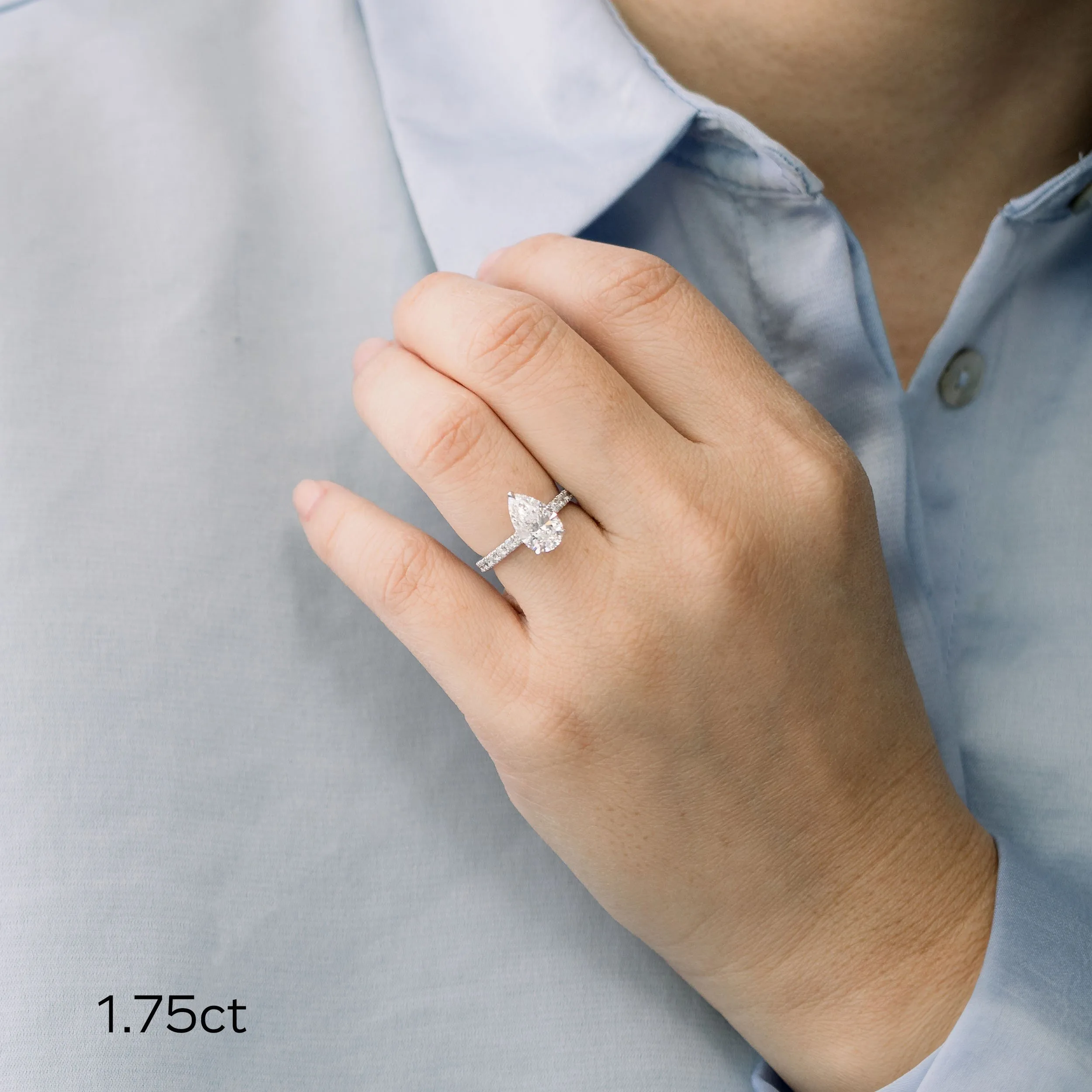 platinum 1.75 carat pear cut lab grown diamond engagement ring with pavé band ada diamonds design ad211 on model
