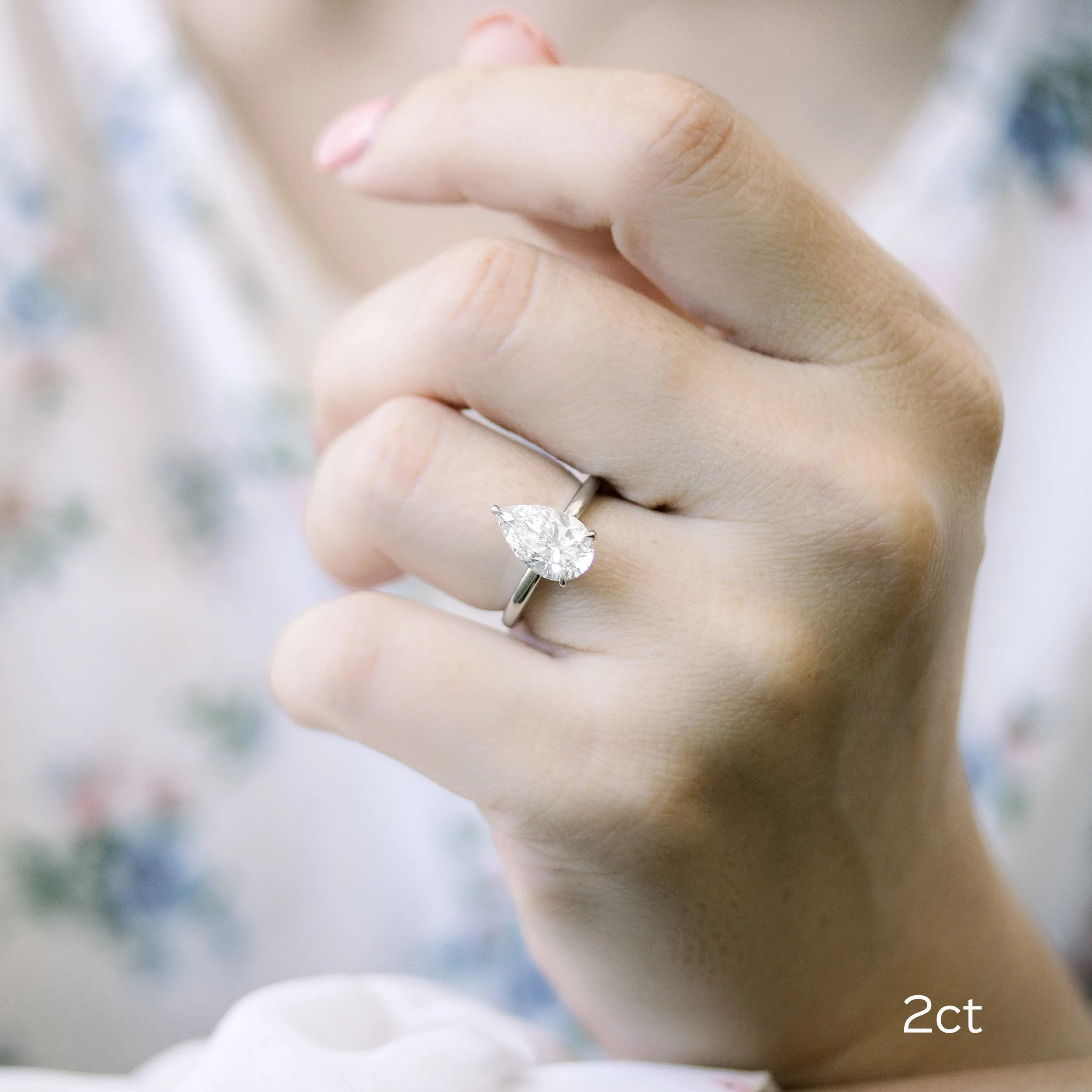 platinum two carat pear solitaire lab engagement ring on model ada diamonds design ad 187