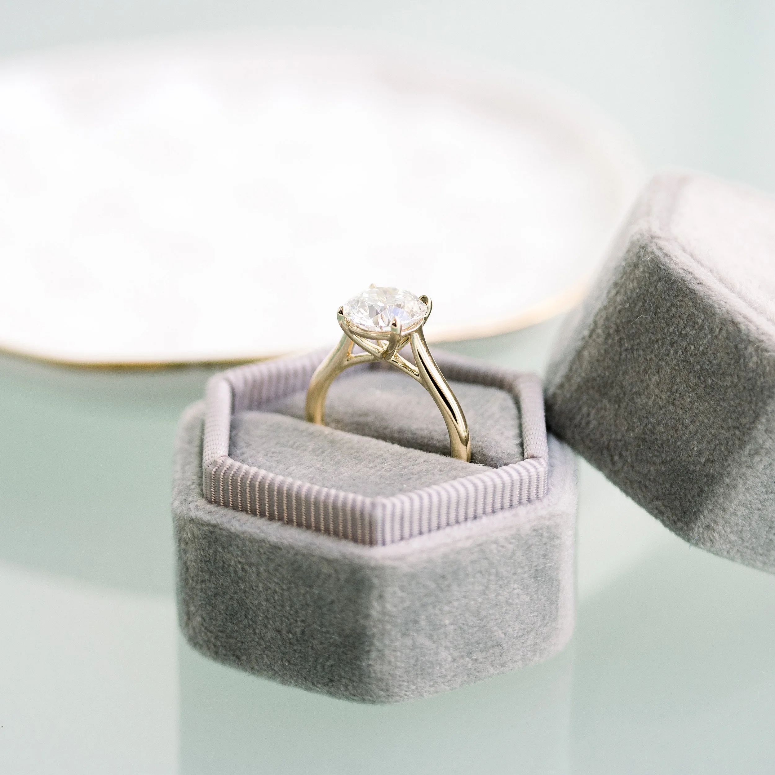 profile view of yellow gold 1.75 carat round manmade diamond solitaire engagement ring ada diamonds design ad 069