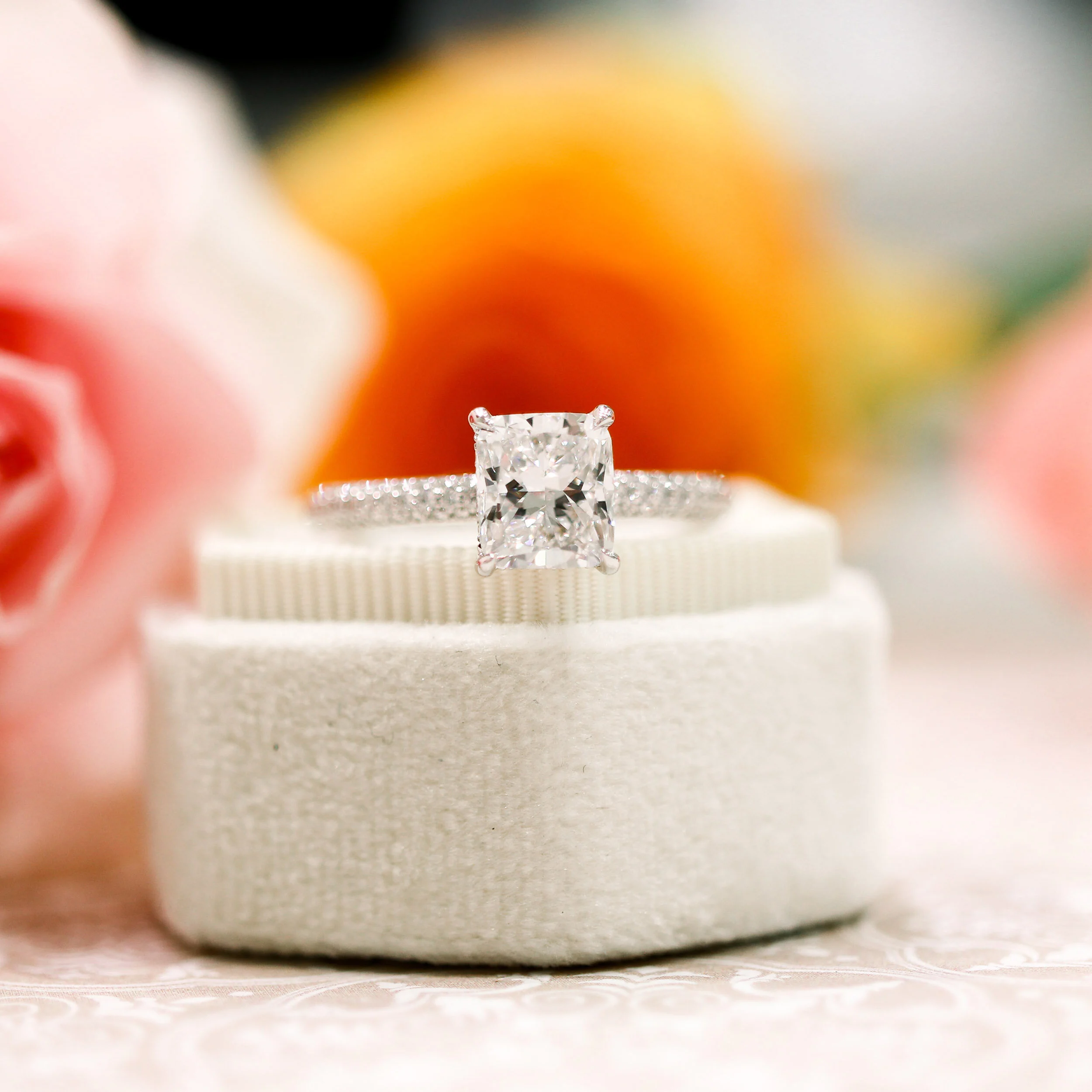 18k White Gold 2.5ct Cushion Cut Three Sided Pavé Engagement Ring with Diamond Basket Made With Lab Diamonds Ada Diamonds Design AD-172 Macro Shot in White Box