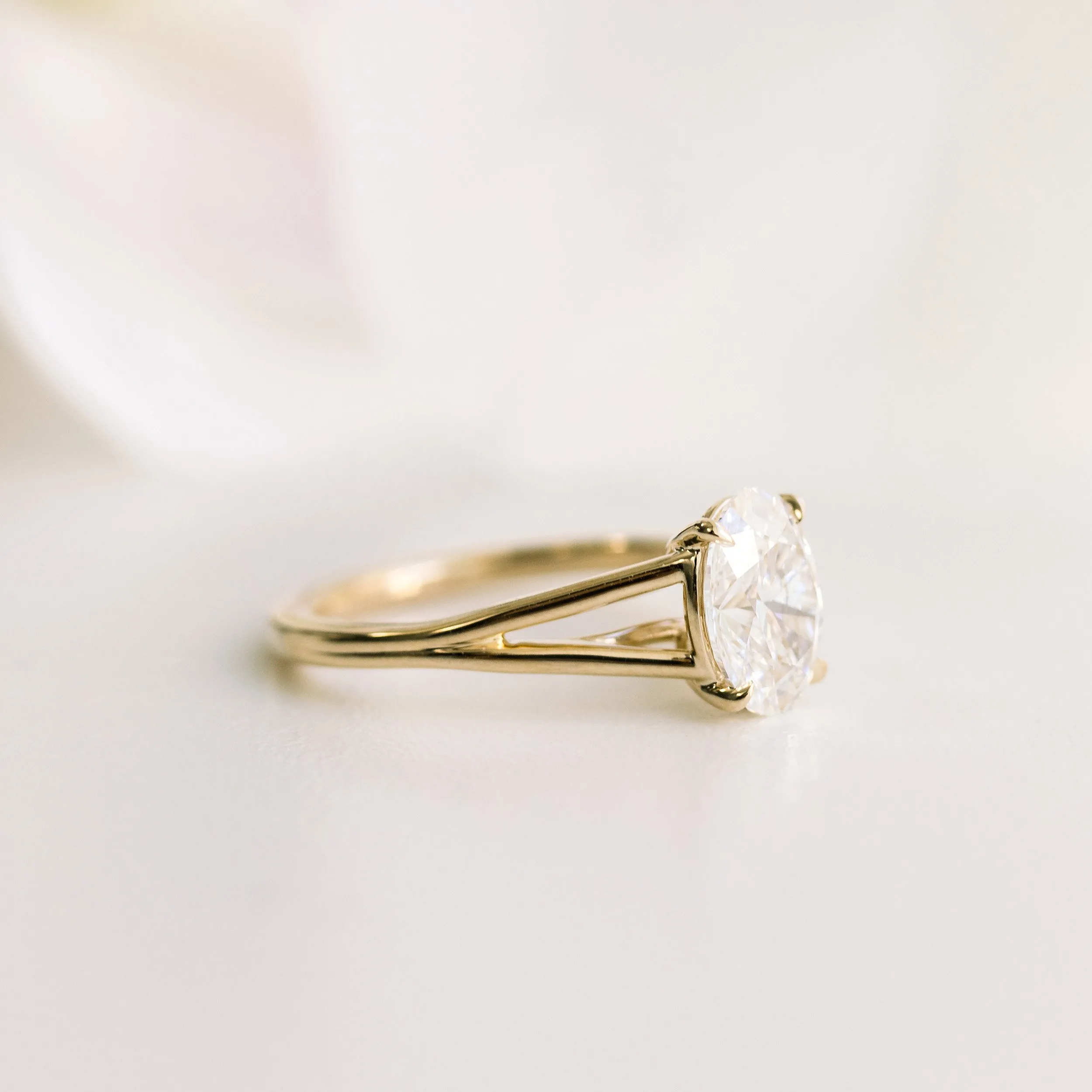 14k yellow gold 1.75 ct oval man made diamond in split shank solitaire engagement ring ada diamonds design ad 338 profile view