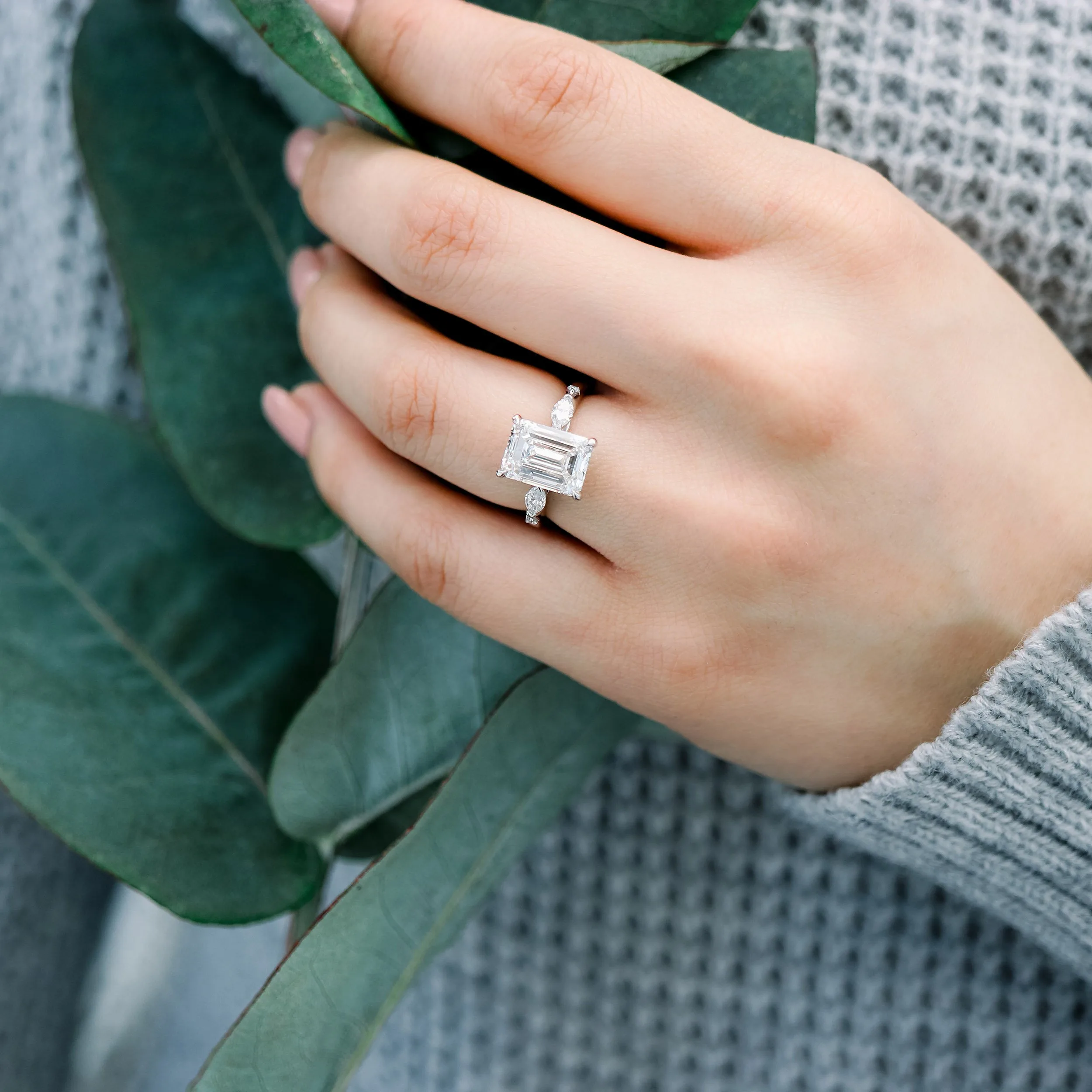 four carat emerald cut and marquise lab diamond engagement ring in platinum ada diamonds design ad 180 on model