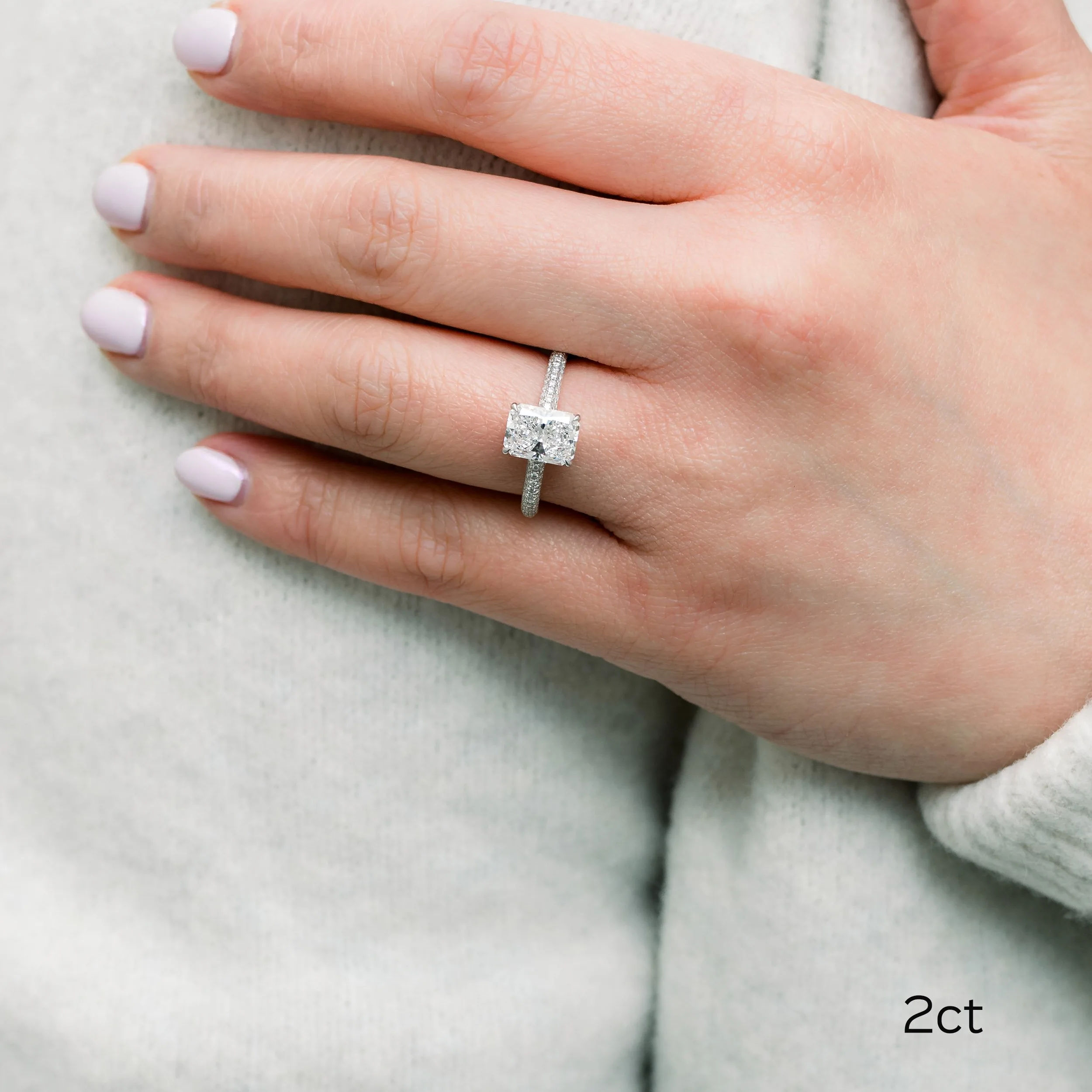platinum three sided pavé lab diamond engagement ring with 2 ct radiant cut lab diamond ada diamonds design ad172 on model