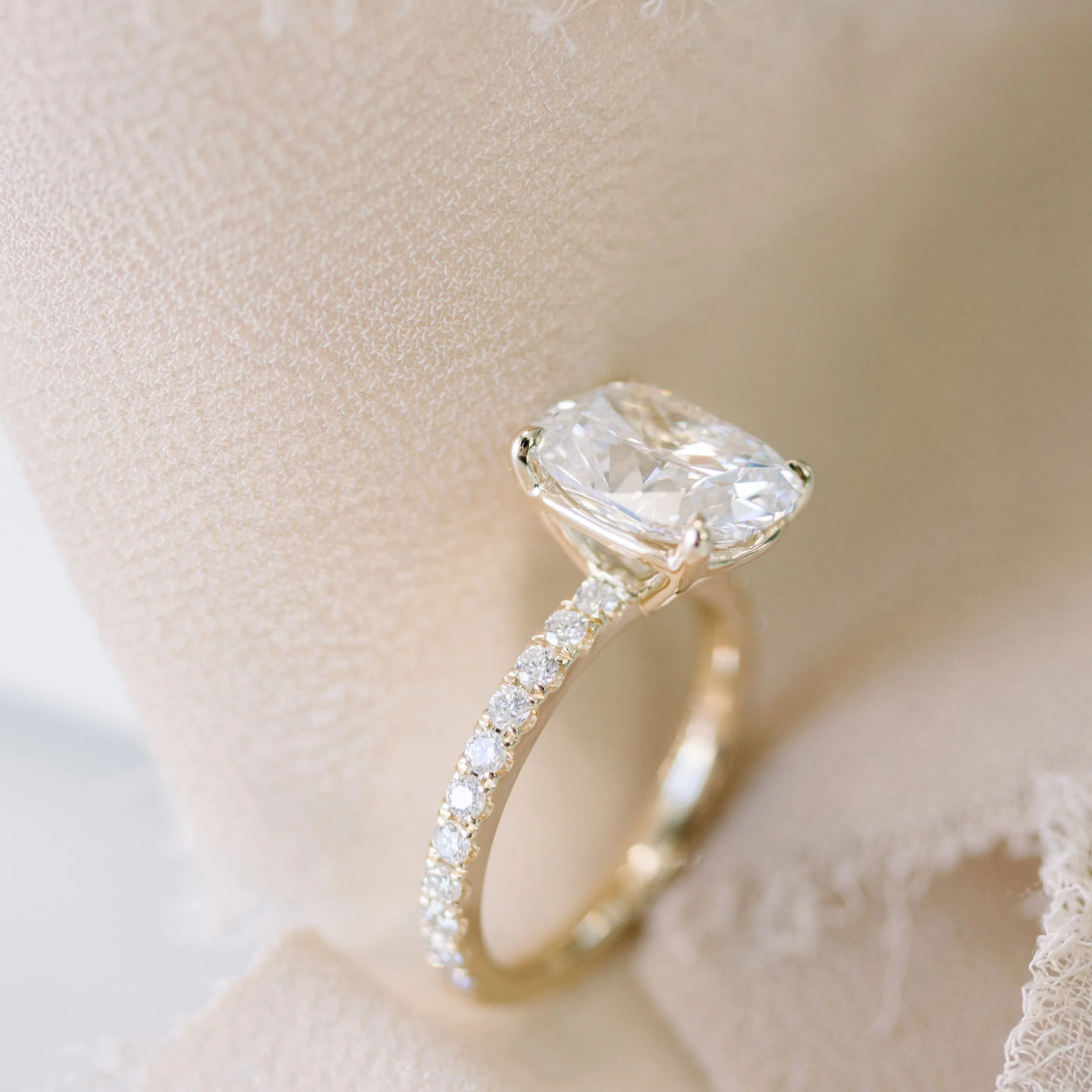 yellow gold cushion pave engagement ring