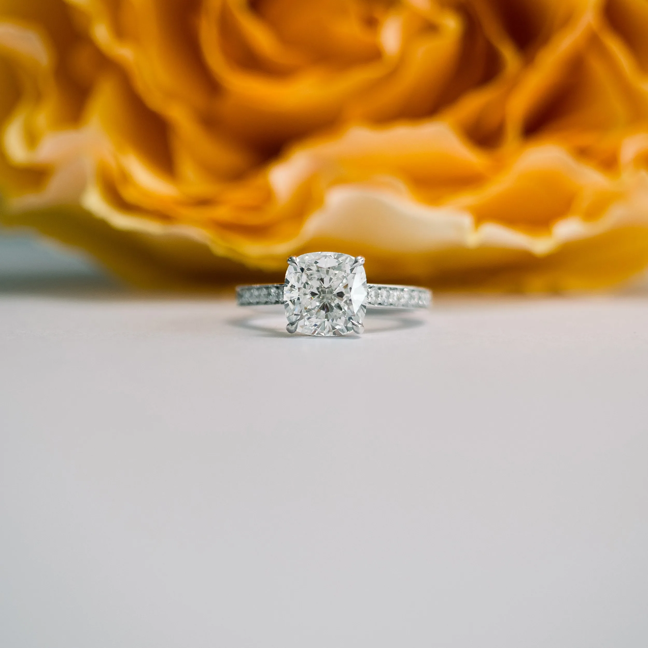 platinum 3 carat cushion man made diamond channel setting engagement ring ada diamonds design ad 074 macro