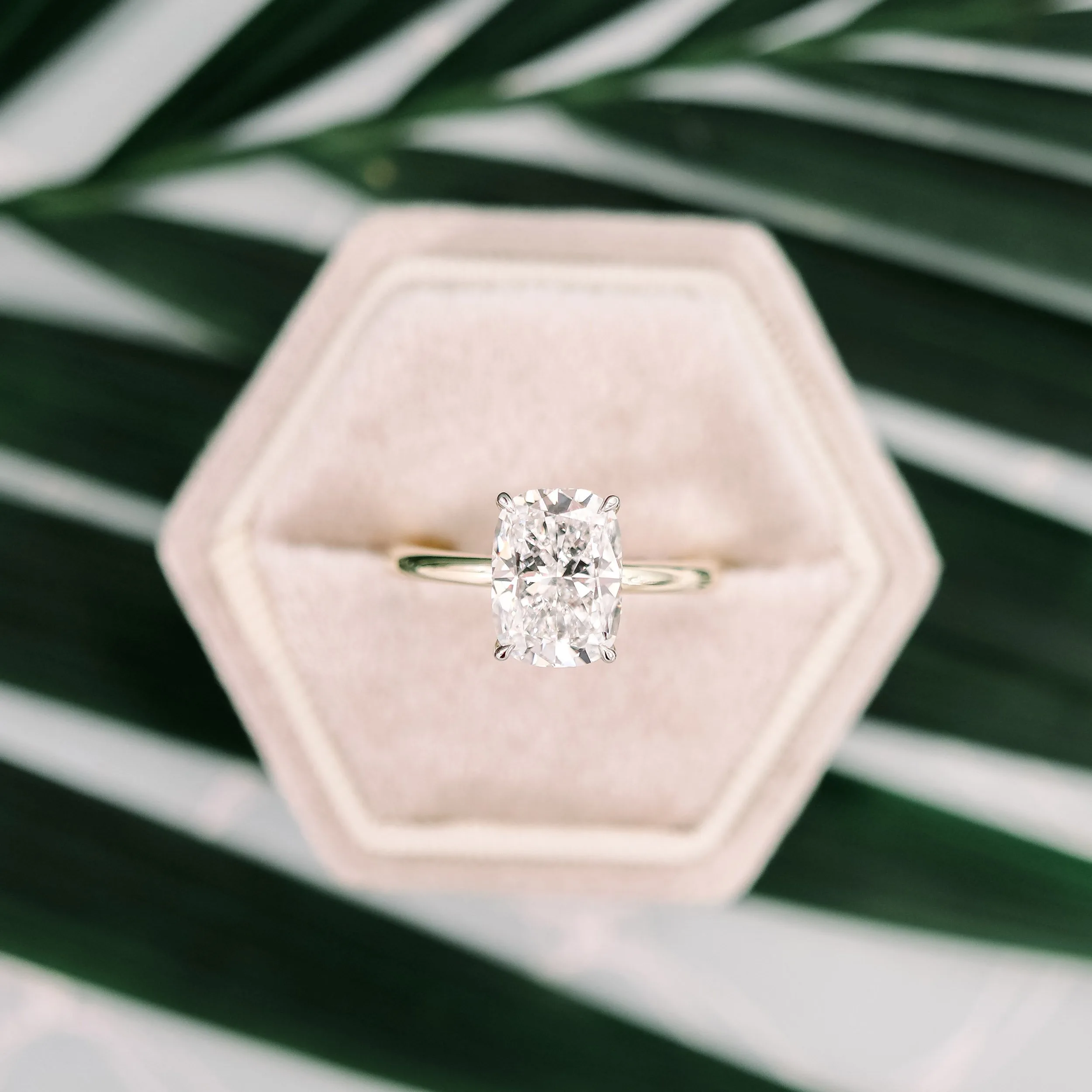 elongated lab grown cushion diamond in solitaire