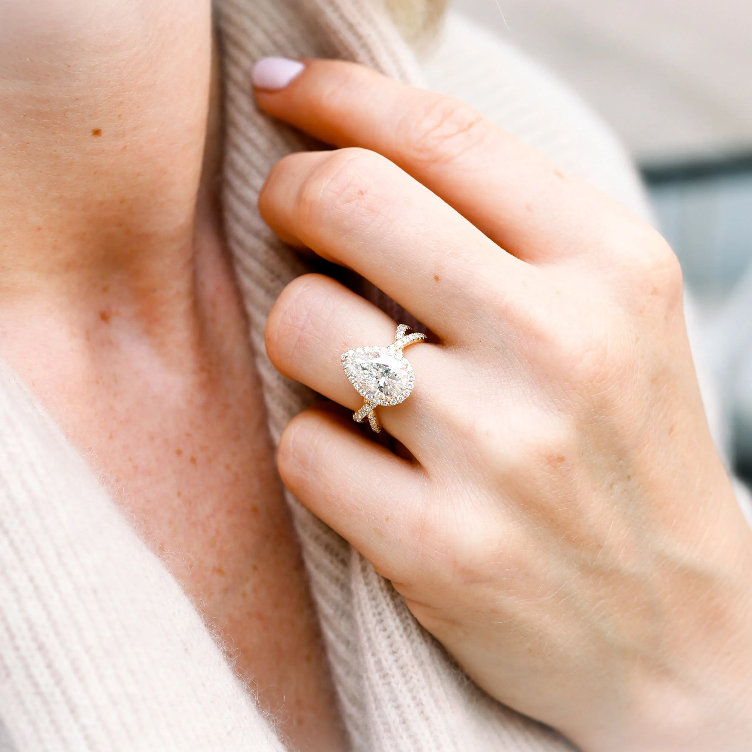18k Yellow Gold 3 Carat Pear Lab Diamond Halo Engagement Ring with Twisting Diamond Band Ada Diamonds Design AD-179 on Model