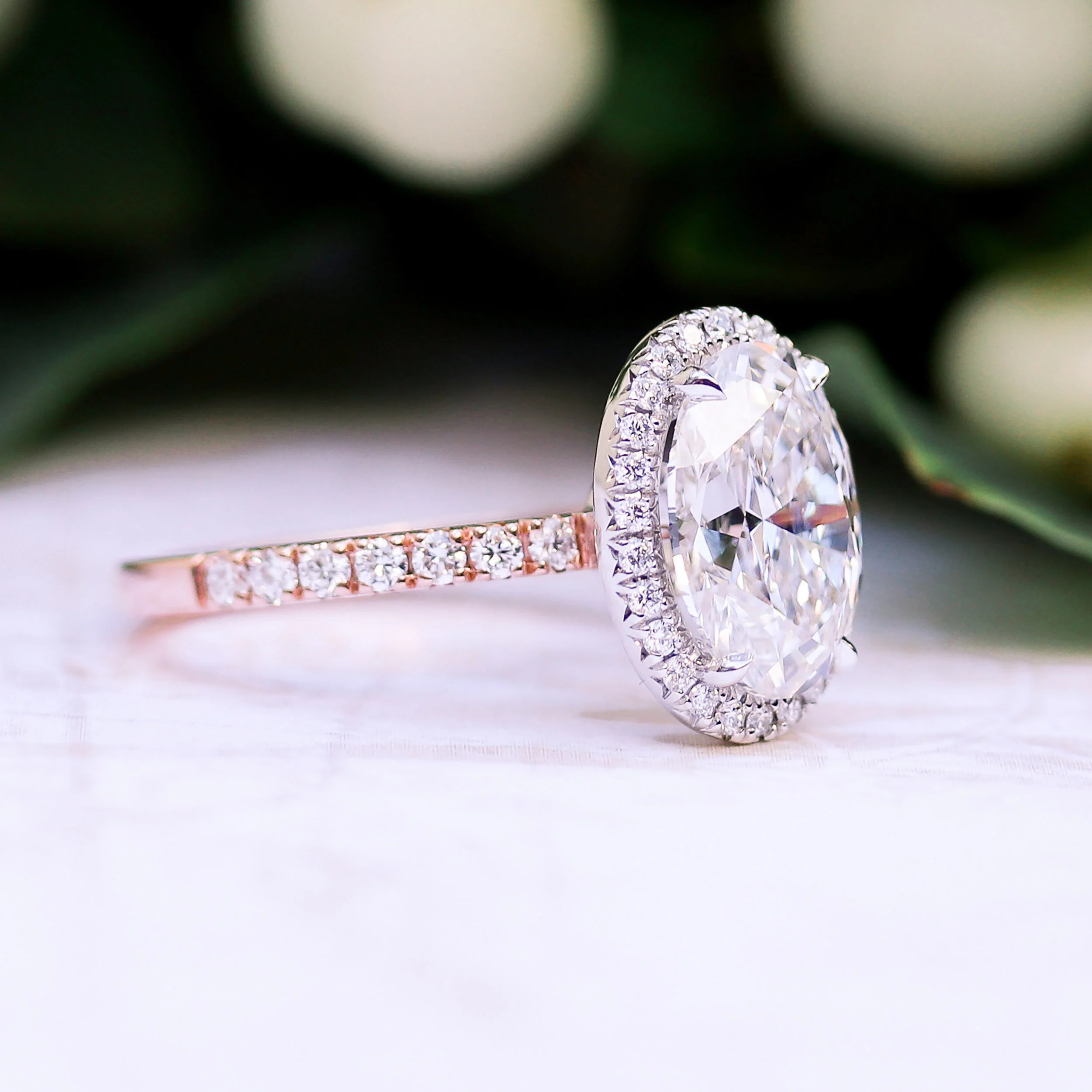 14k White and Rose Gold Three Carat Custom Oval Halo Engagement Ring with Lab Diamonds Ada Diamonds Design Number 179 Side View