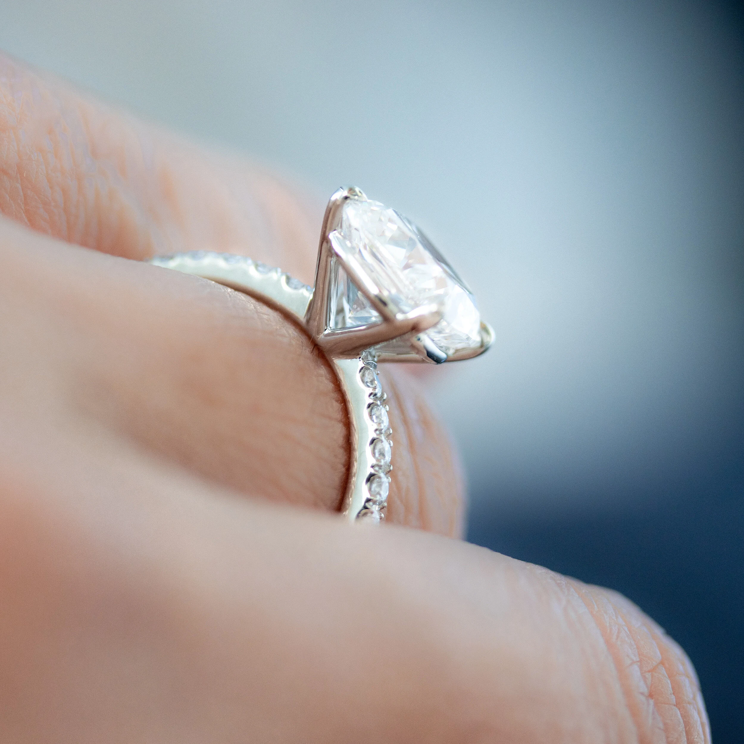Platinum 2.5ct Cushion Cut Lab Diamond Four Prong Pavé Engagement Ring Ada Diamonds Design AD-214 Profile on Hand