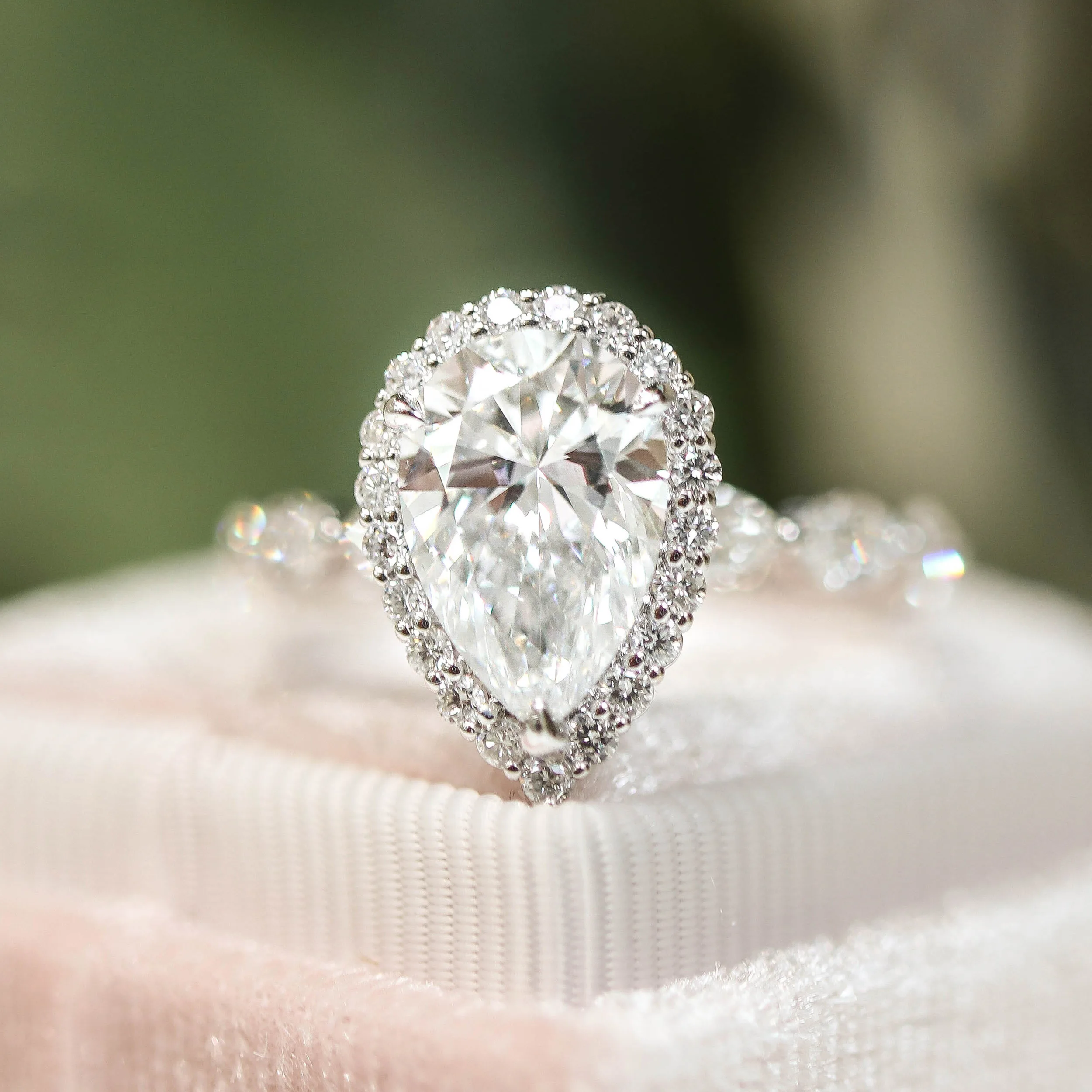Platinum 3.5 Carat Pear Halo Lab Diamond Engagement Ring with Marquise Band in Platinum Ada Diamonds Design AD-179 Macro Shot
