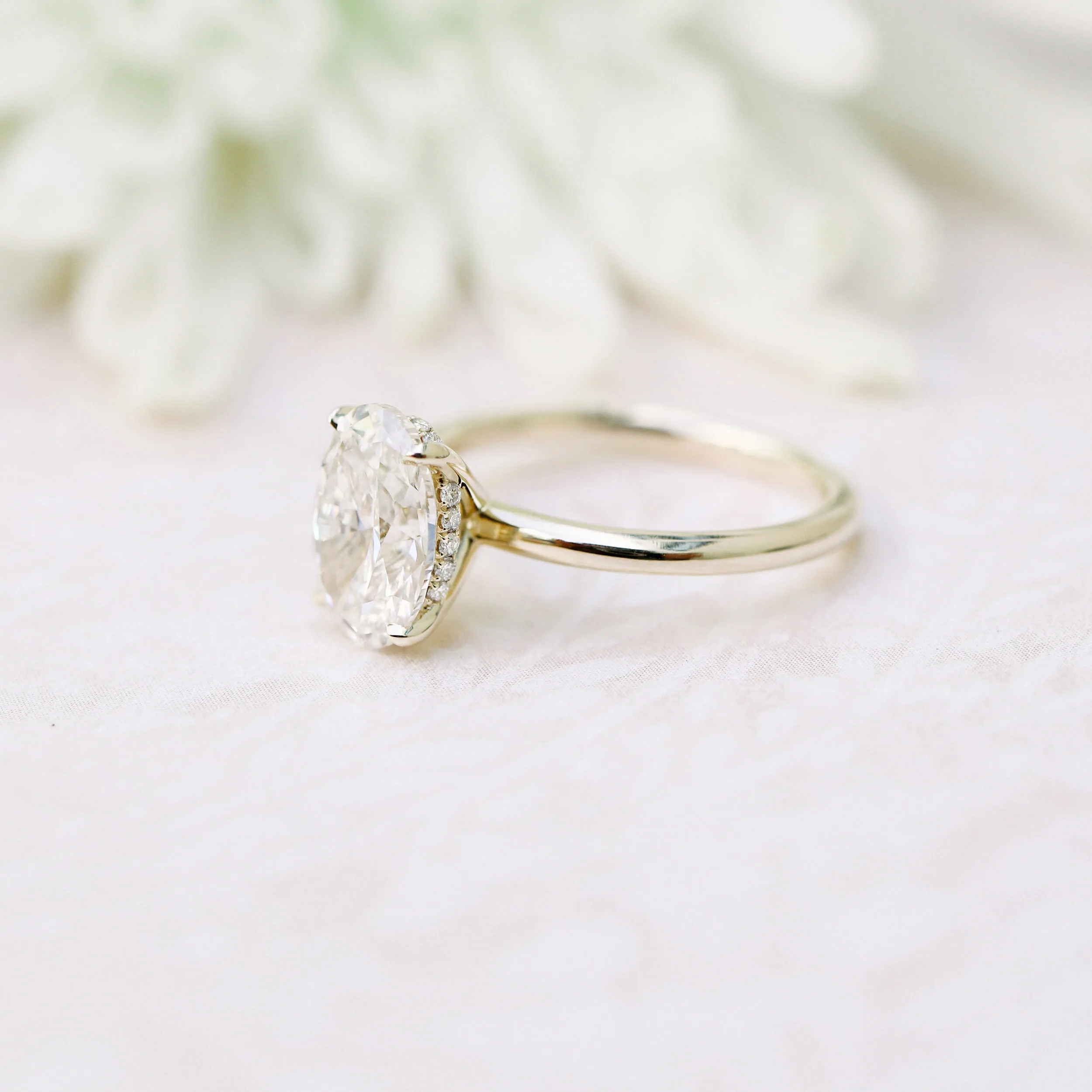 14k Yellow Gold 2 Carat Oval Solitaire Engagement Ring Featuring Lab Diamonds Ada Diamonds Design Number 143 Artistic Shot