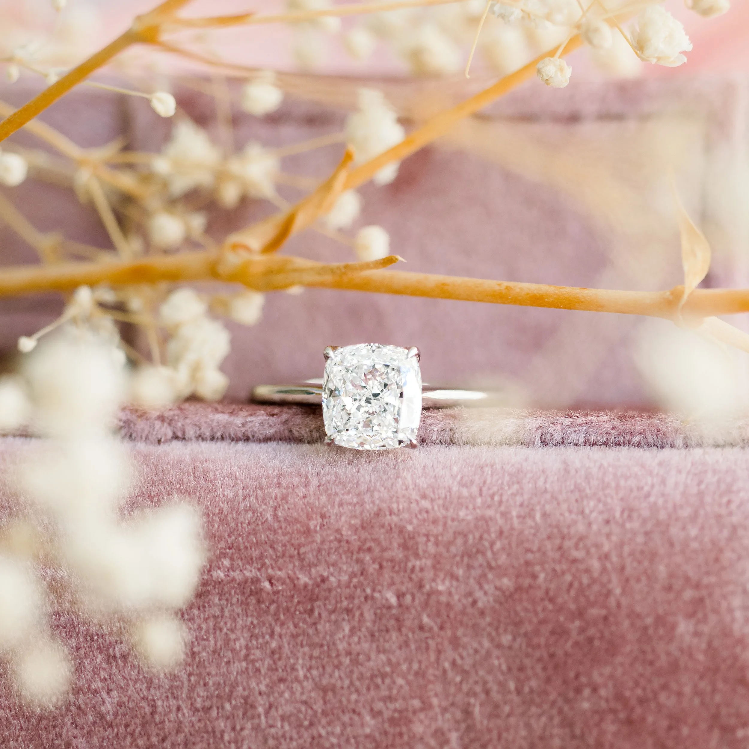 platinum floral solitaire engagement ring with 2 ct cushion cut man made diamond ada diamonds design ad368 on model
