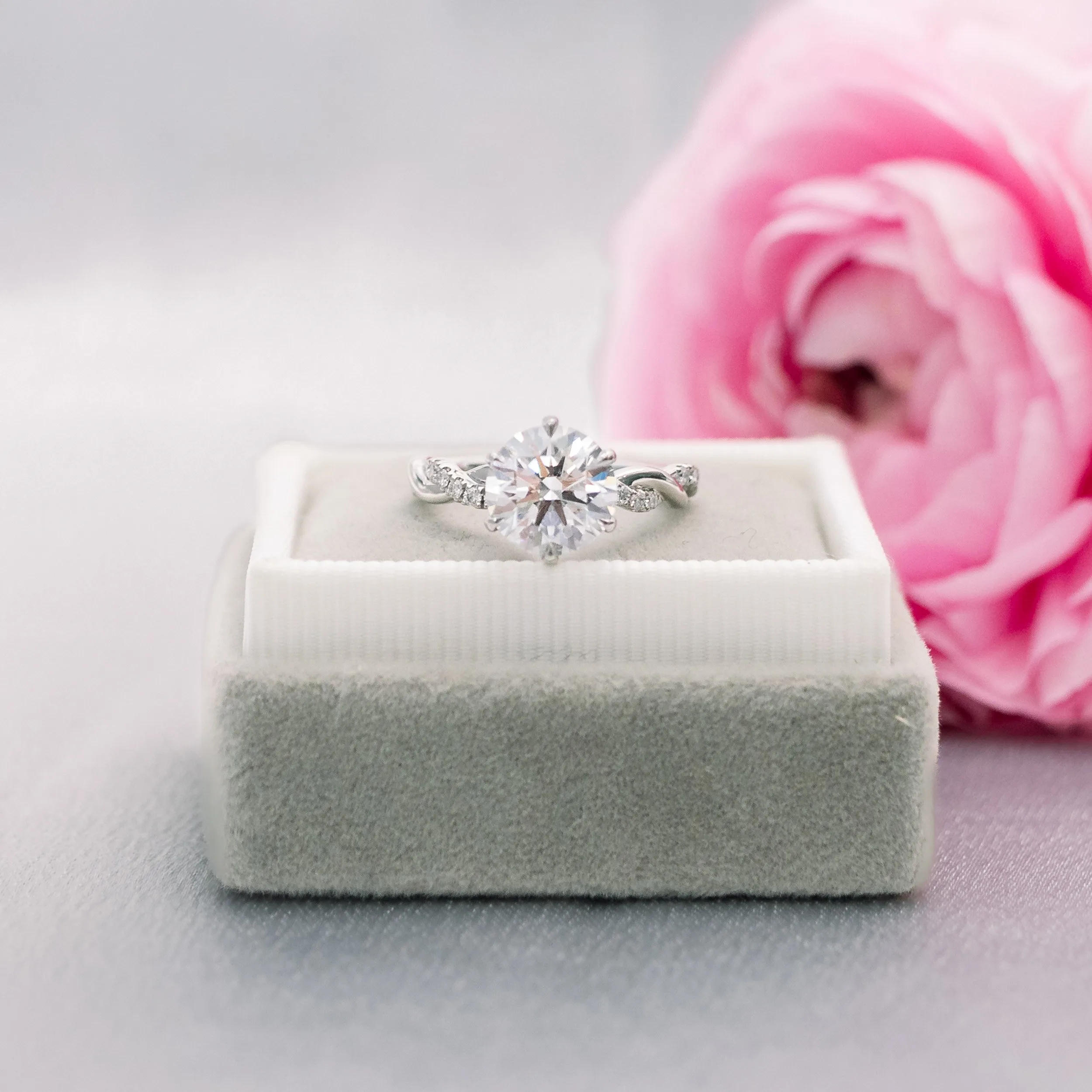 18k white gold 2ct round man made diamond engagement ring with custom twisting diamond band ada diamonds design ad 178