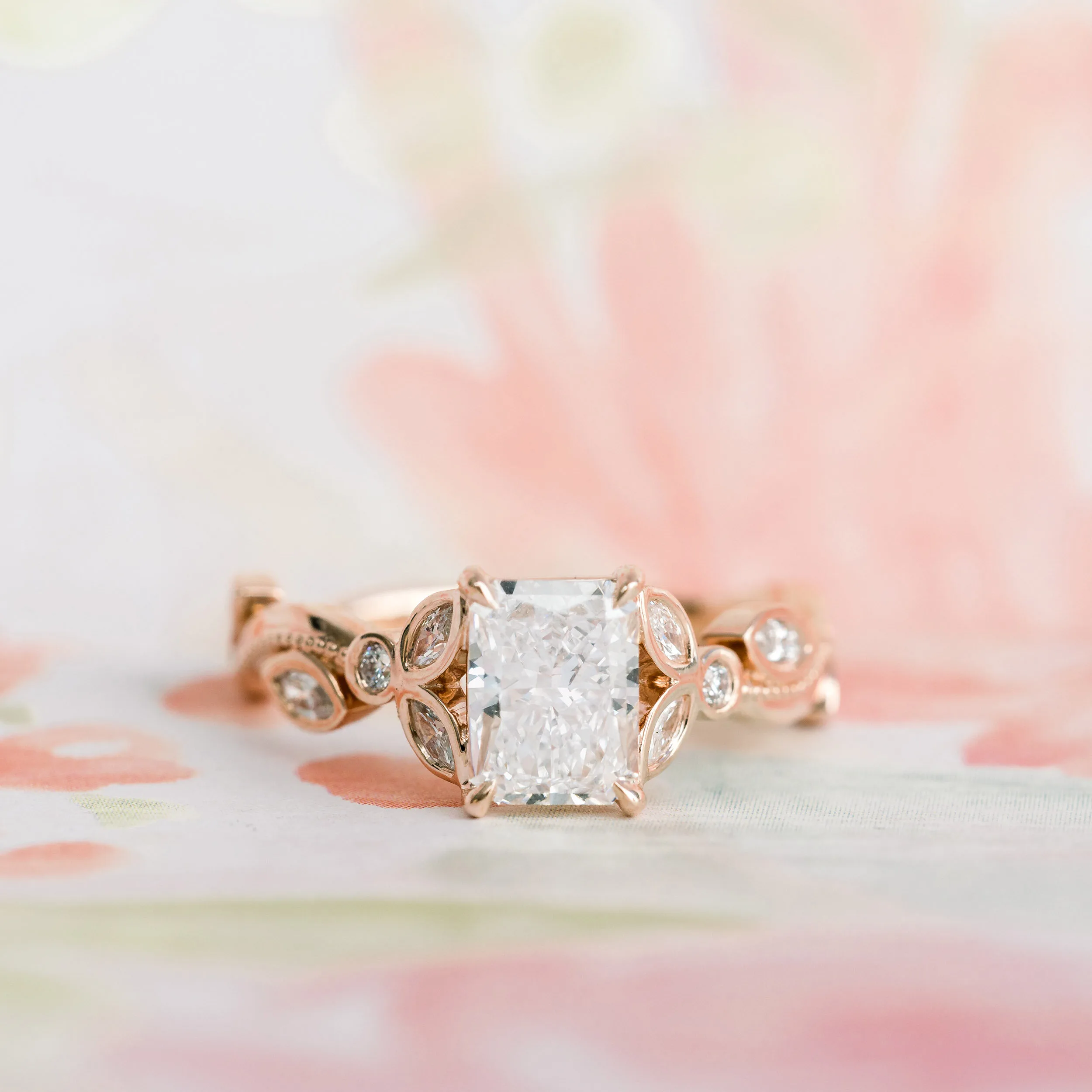14k Rose Gold 1.5 Carat Radiant Lab Diamond Engagement Ring with Leaf Inspired Band of Marquise and Round Lab Diamonds Ada Diamonds Design AD-178 Artistic