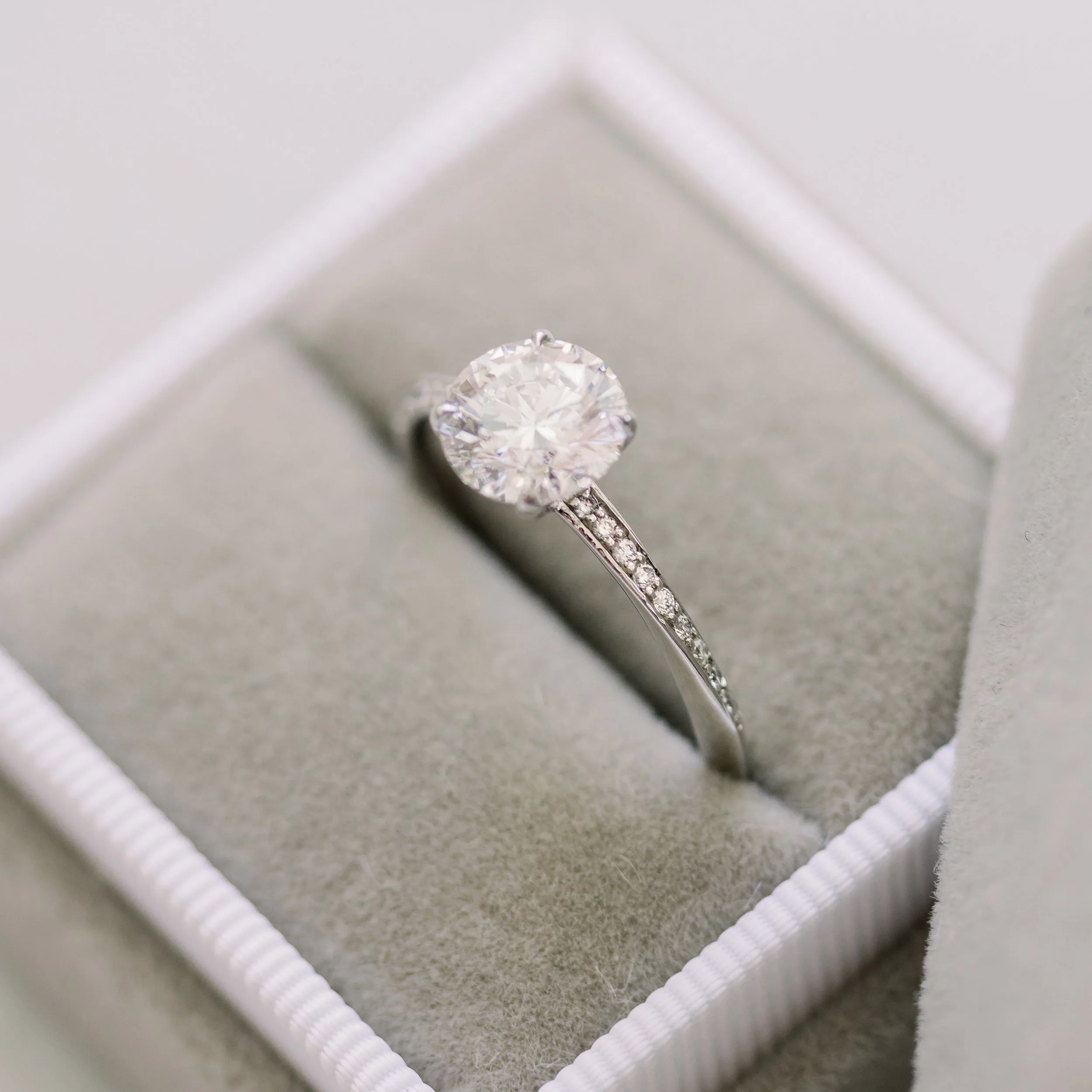 Platinum 1.5 Carat Round Lab Diamond Ring with Knife-Edge Spiral Diamond Band Ada Diamonds Design AD-178