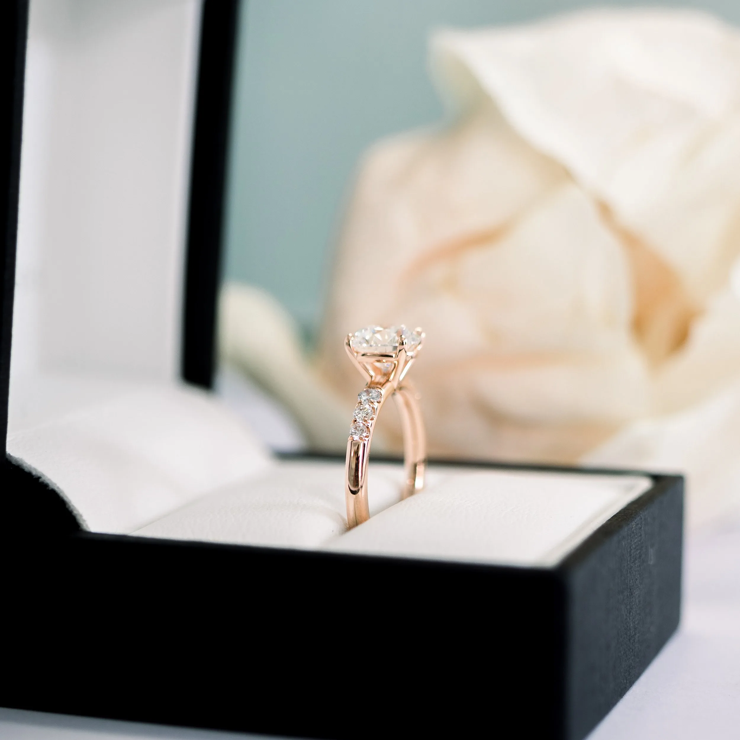 14k rose gold 1.25ct round lab diamond engagement ring with reverse taper diamond band ada diamonds design ad 178 profile view