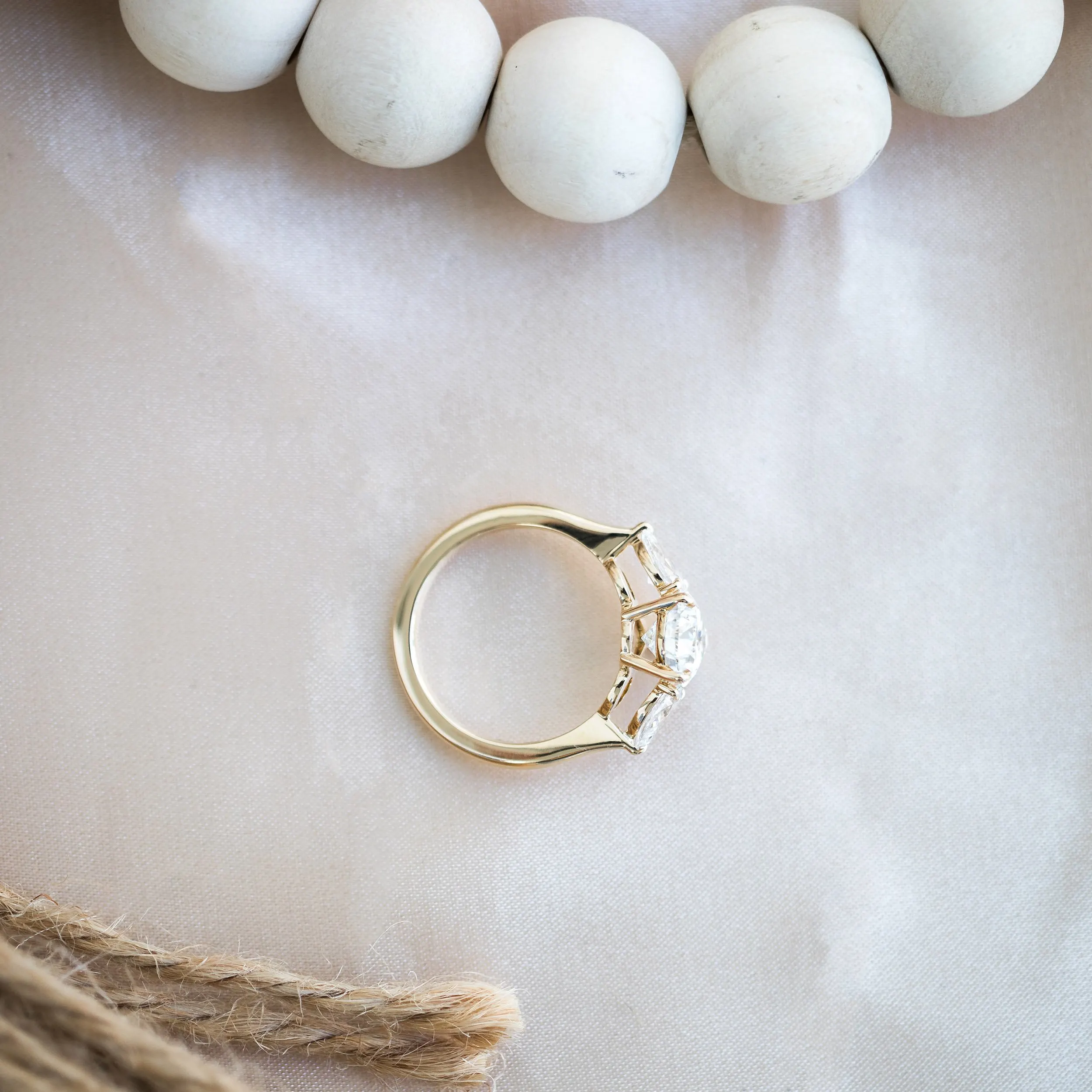 14k yellow gold three stone pear engagement ring with lab diamonds ada diamonds design ad 218 profile view