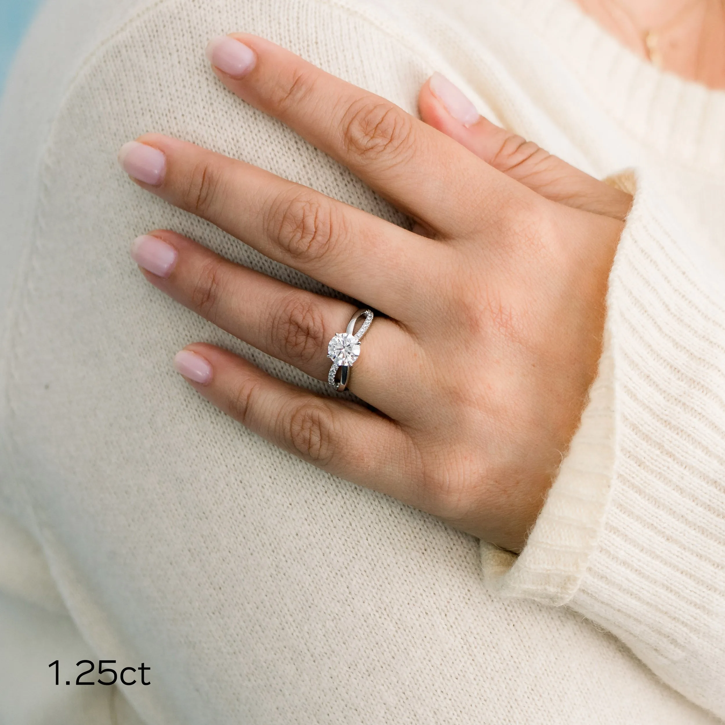 platinum 1.25ct round lab diamond engagement ring with open twisting diamond band ada diamonds design ad 154