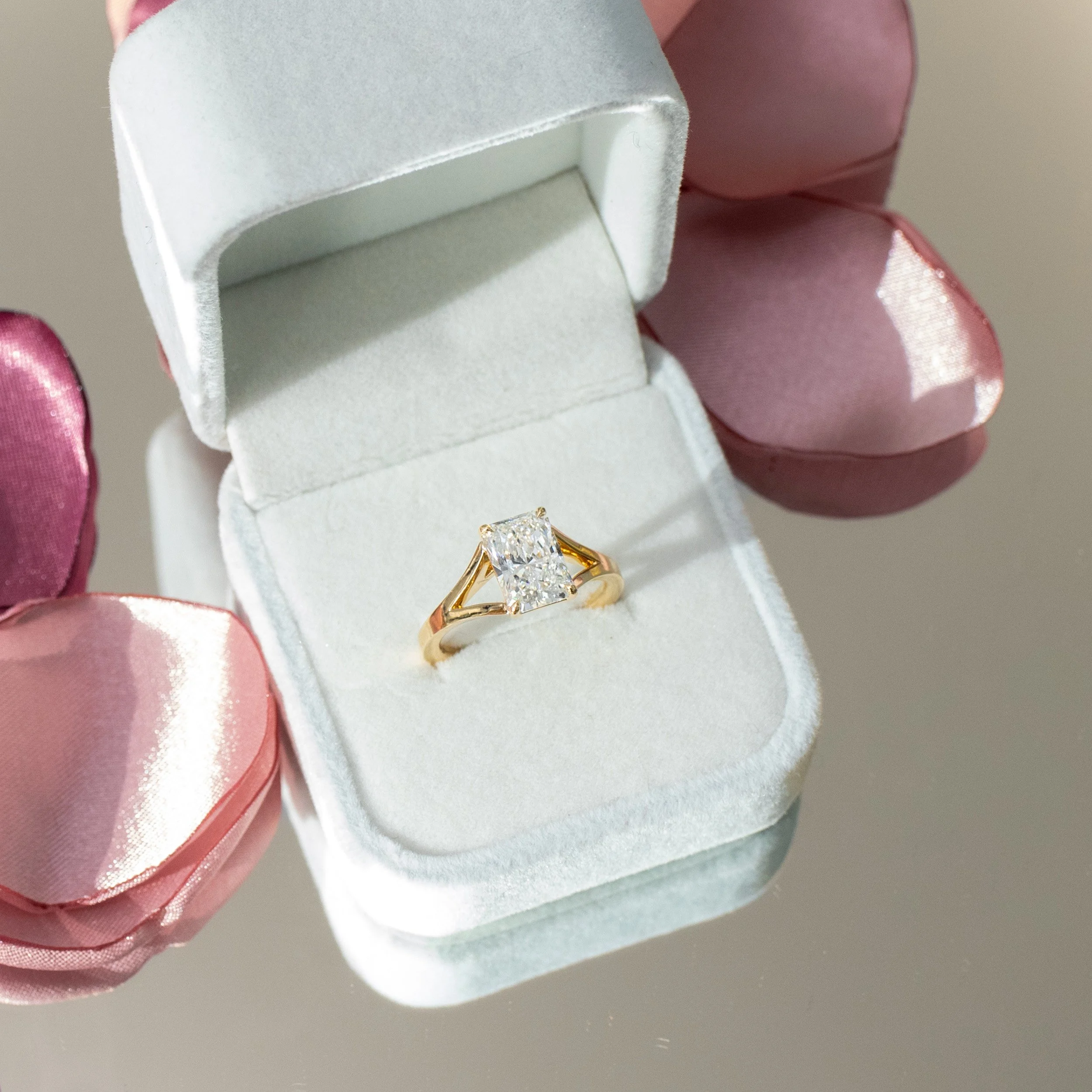 18 Karat Yellow Gold Split Shank Solitaire Diamond Engagement Ring featuring High Quality 2.5 Carat Lab Created Diamonds