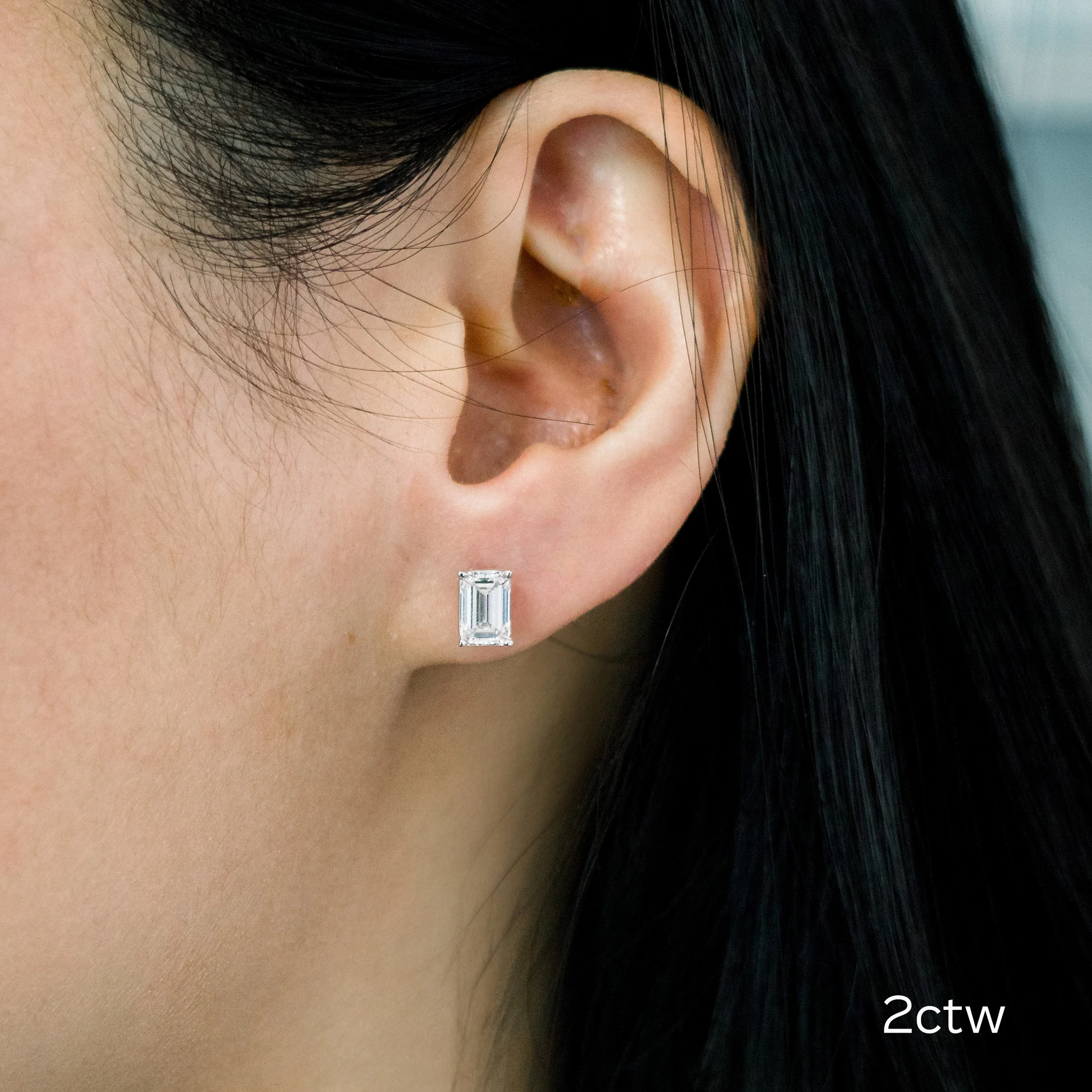 14k white gold 2 carat emerald cut lab diamond stud earrings ada diamonds design ad 003 on model