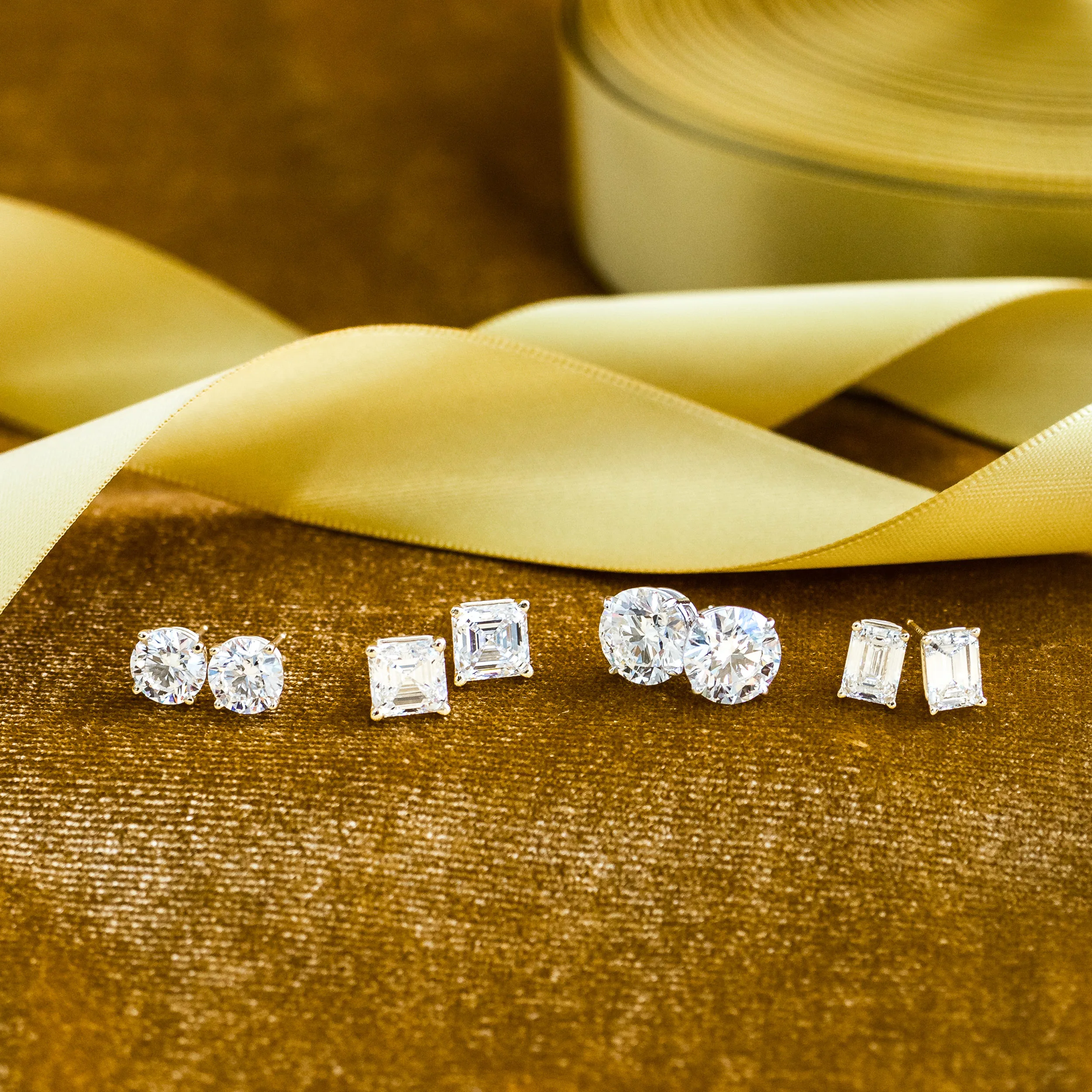 Platinum Round Stud Earrings featuring 2.0 Carat Lab Diamonds (Profile View)