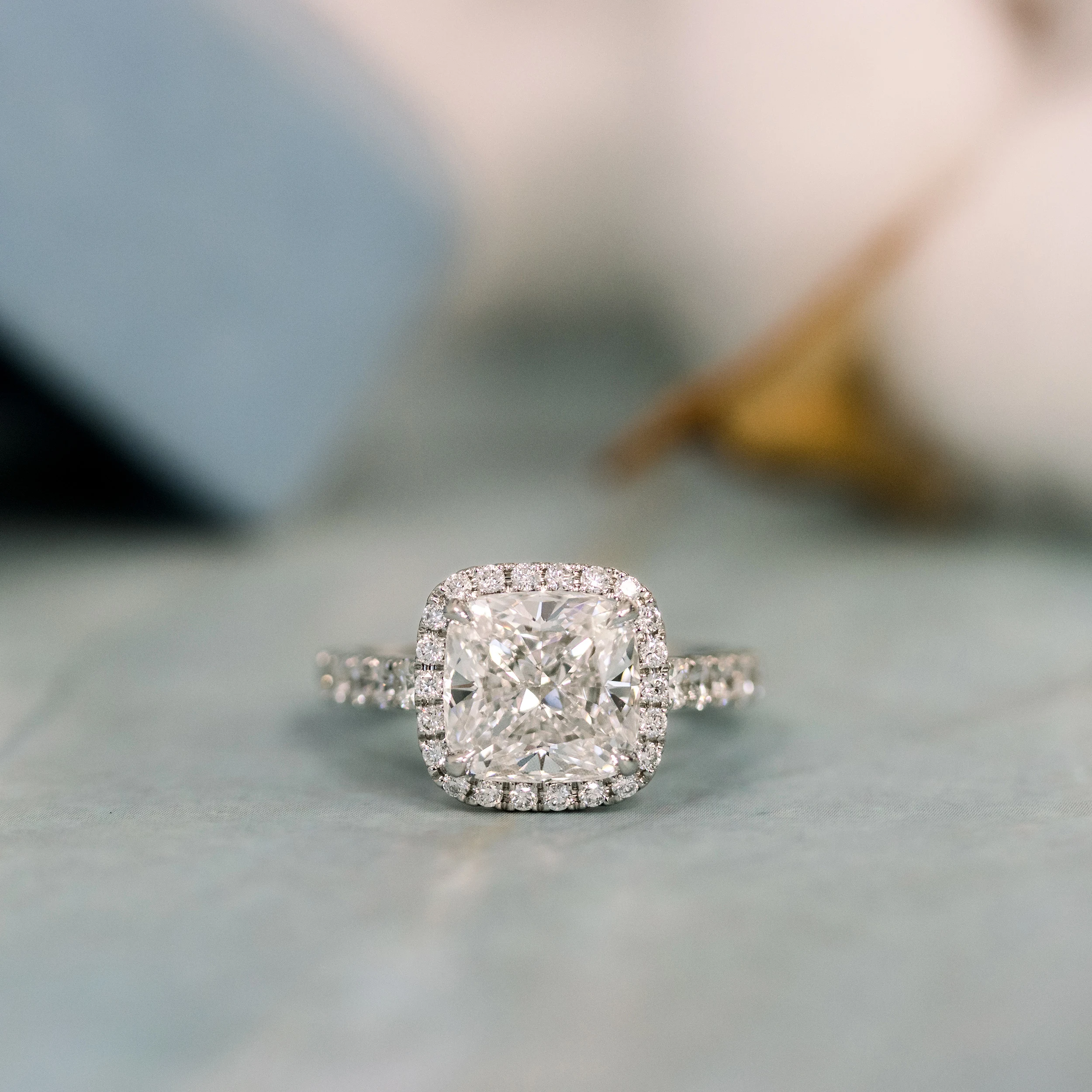 Platinum Cushion Halo Pavé Diamond Engagement Ring featuring High Quality 3.5 ct Lab Diamonds (Main View)