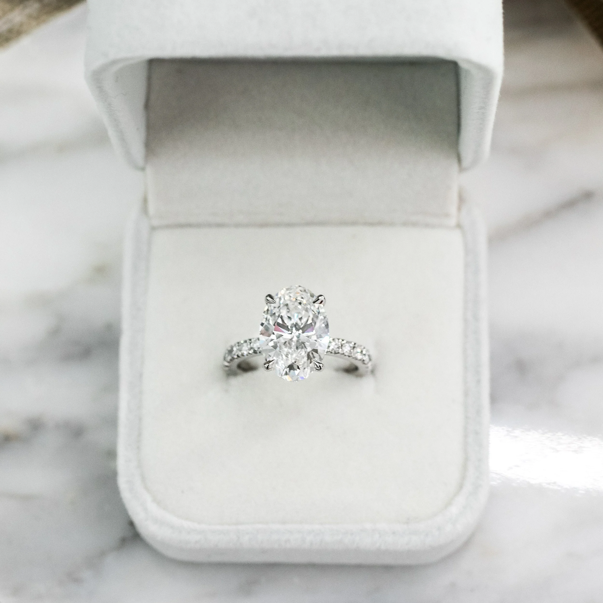 platinum 3.75ct oval cut lab diamond petite four prong engagement ring wtih diamond band ada diamonds design ad 230 macro