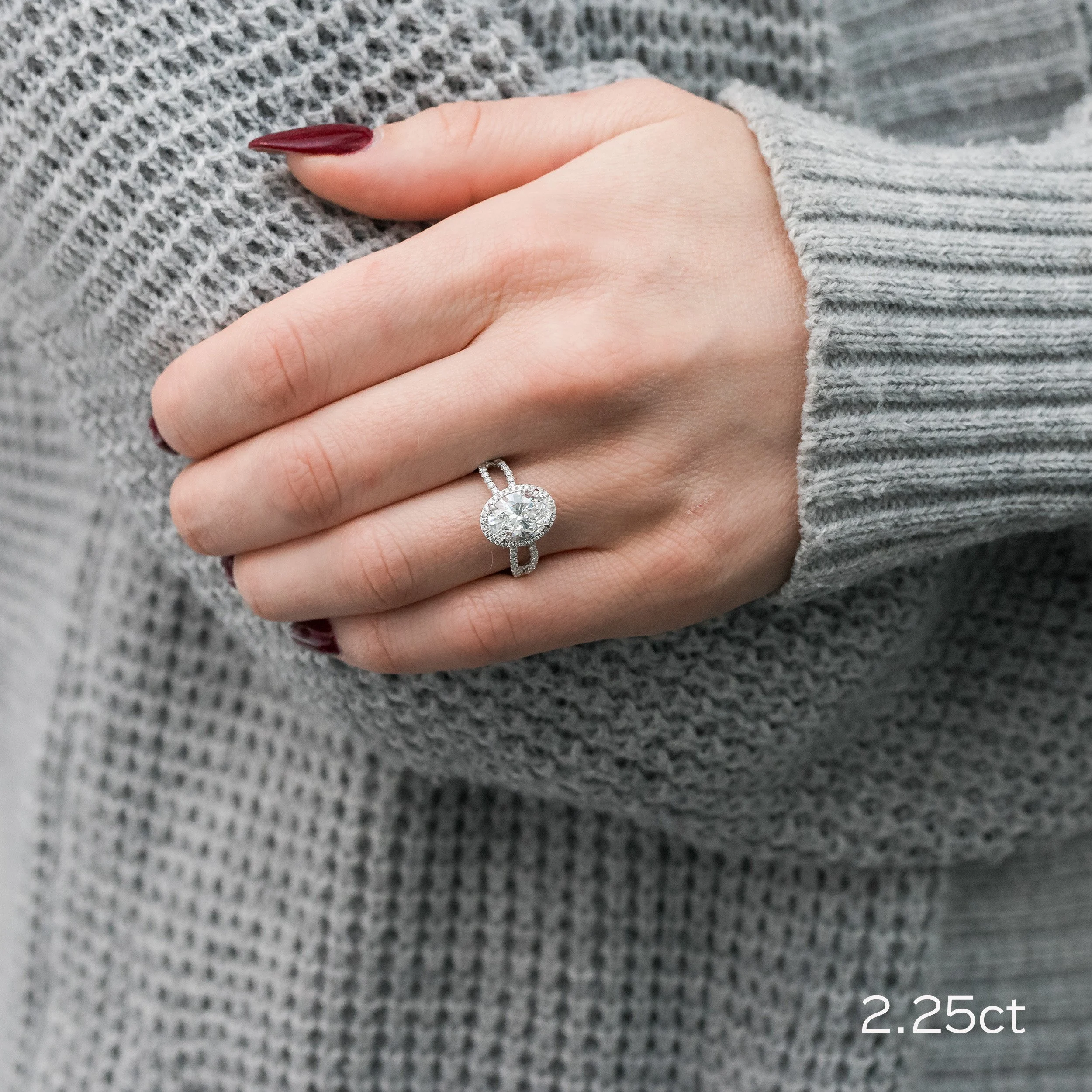 platinum 2.25 carat oval cut halo lab diamond engagement ring with open twist diamond band on model ada diamonds design ad 279
