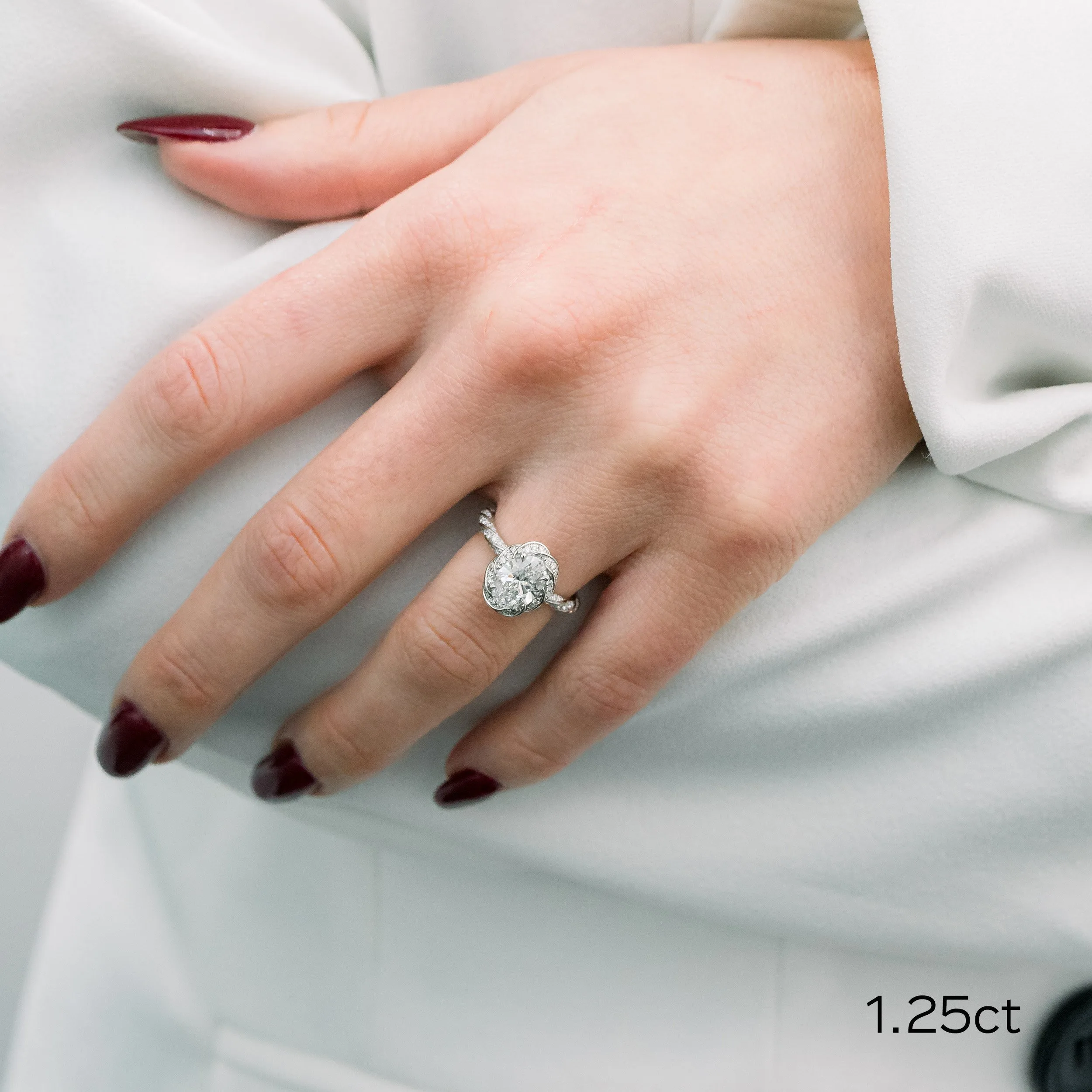 platinum 1.25 carat oval lab diamond in custom twisting halo setting ada diamonds desing ad 179 model